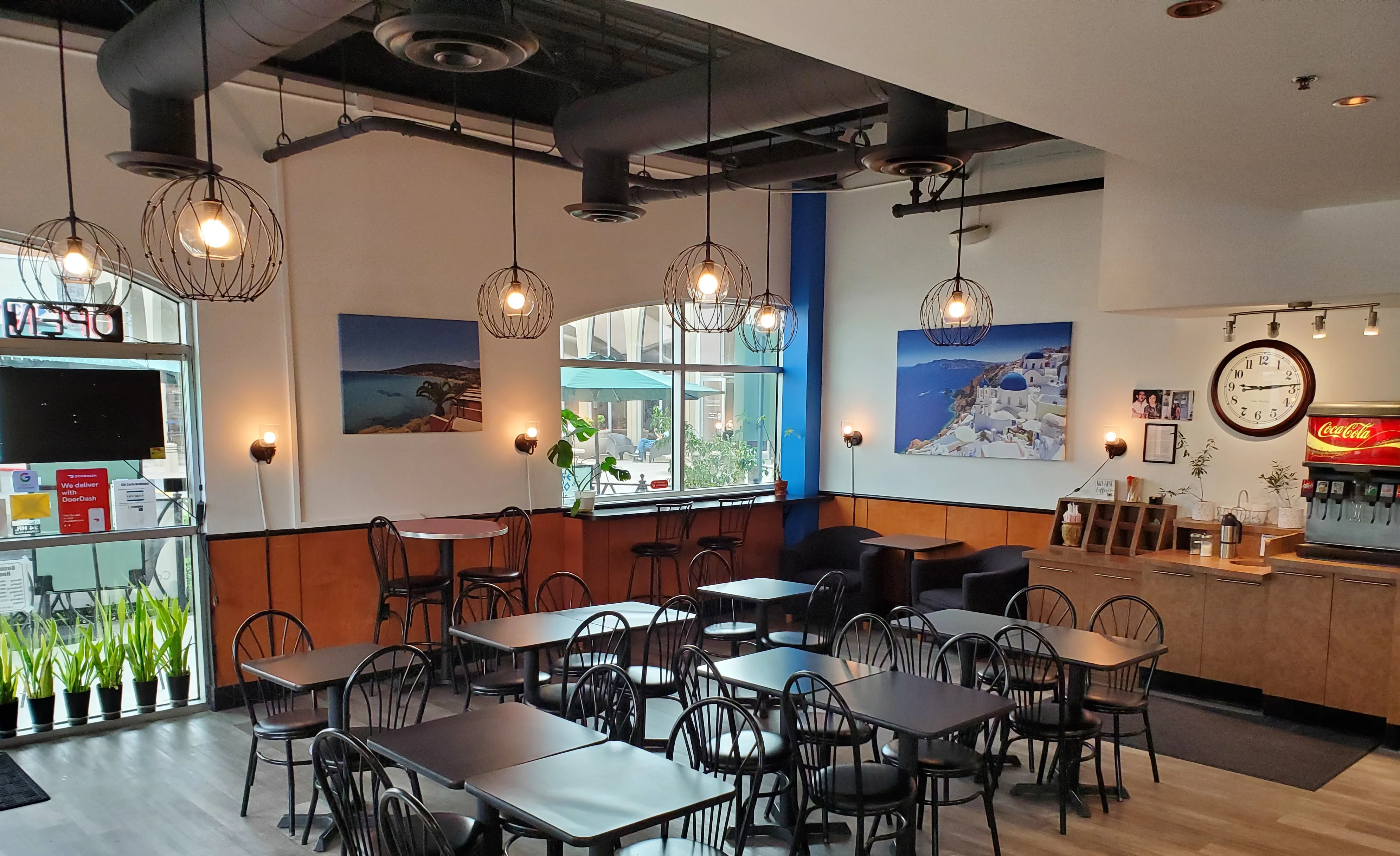 Cozy restaurant interior with modern decor and seating