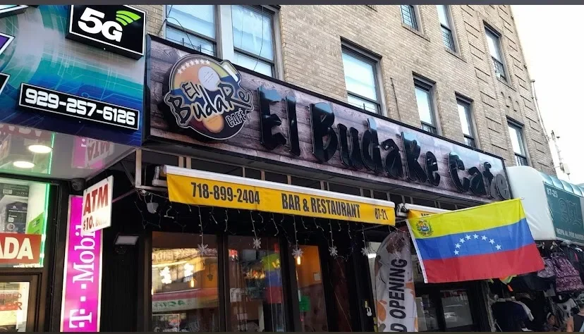 The storefront of El Budare Cafe, a Venezuelan bar and restaurant located at 8721 Roosevelt Ave in Jackson Heights, NY.