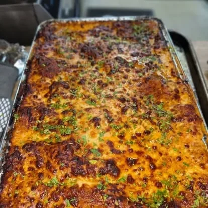 A restaurant chef preparing a dish