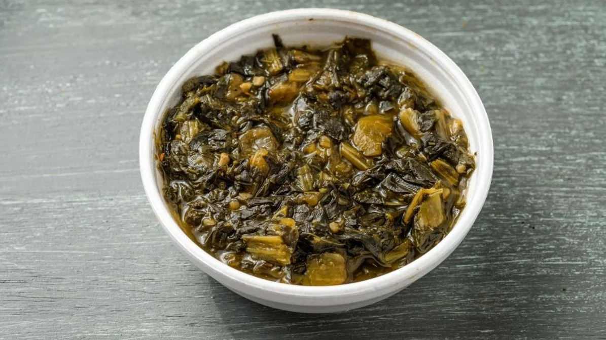 Gris Gris Greens from VooDoo BBQ in Pensacola, a Cajun-style side of slow-cooked seasoned greens.