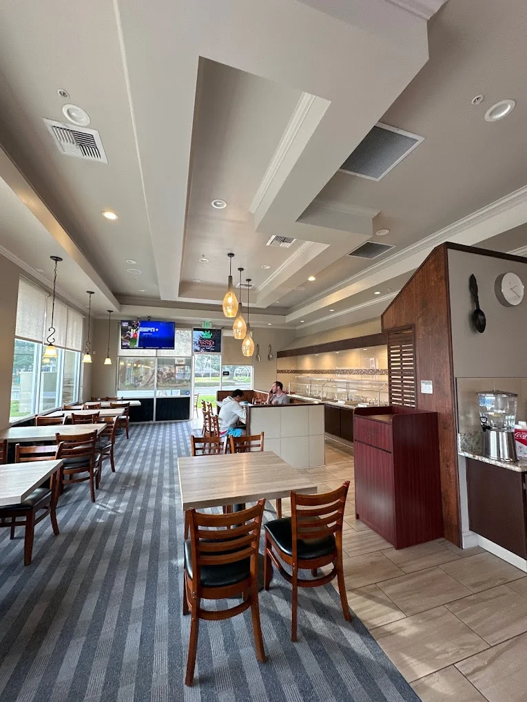 Modern restaurant interior with cozy seating and warm lighting