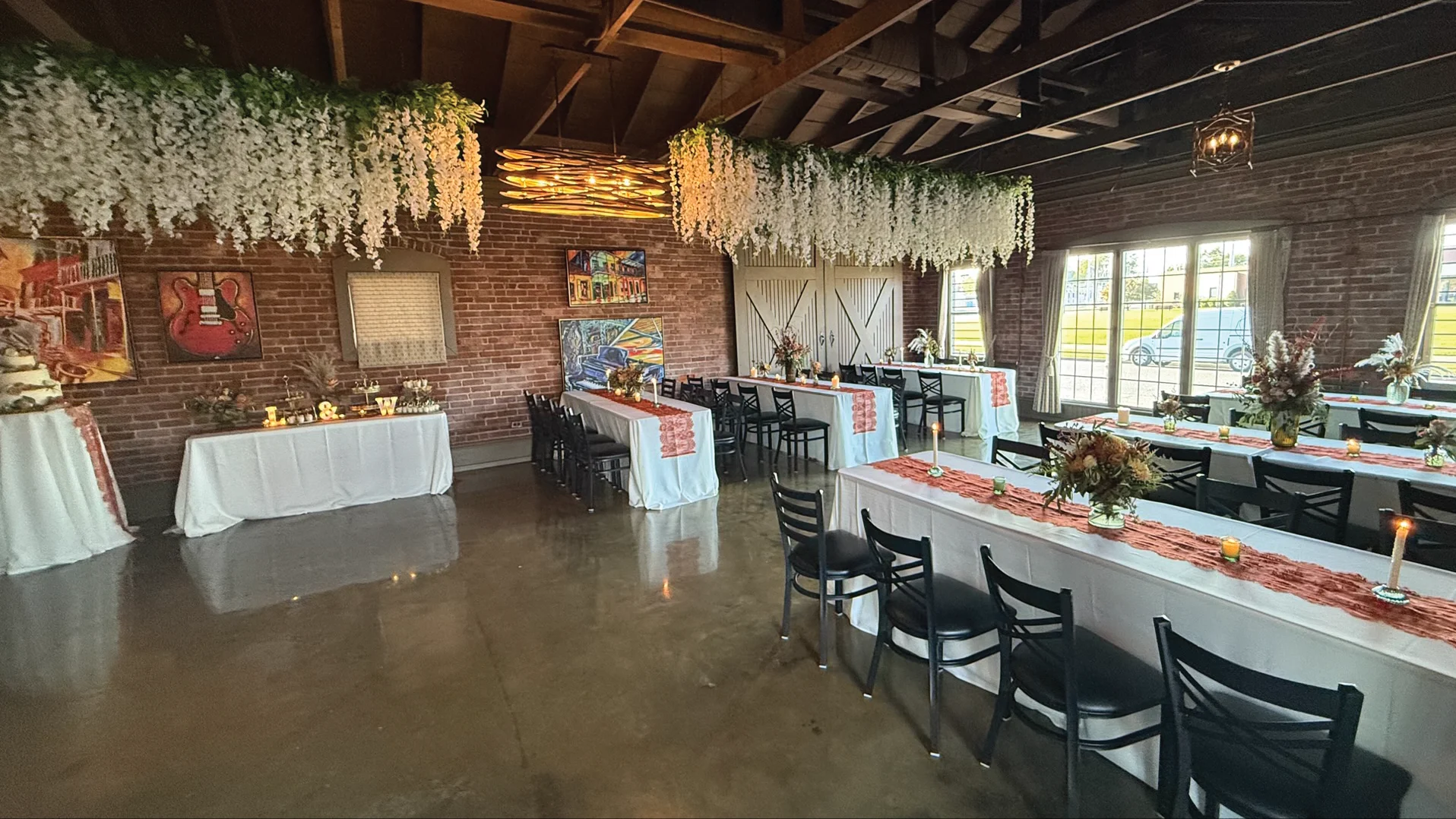 Elegant event space with floral decor and rustic charm