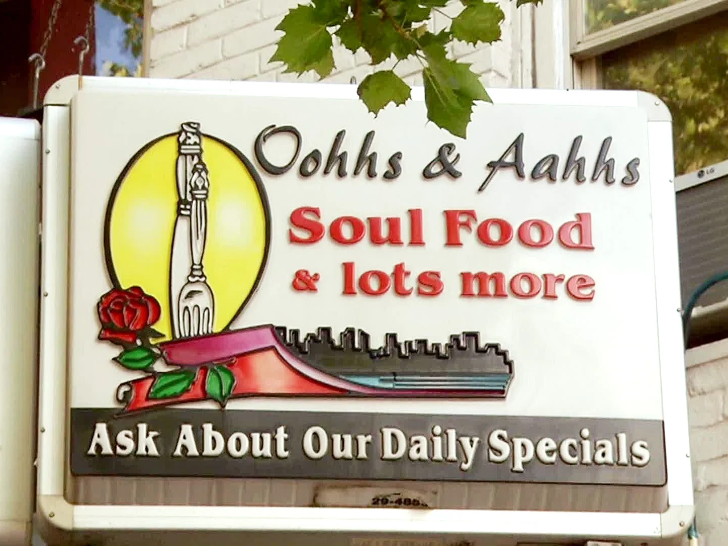 Sign for Oohhs & Aahhs Soul Food restaurant