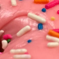 Colorful assortment of donuts with sprinkles and frosting