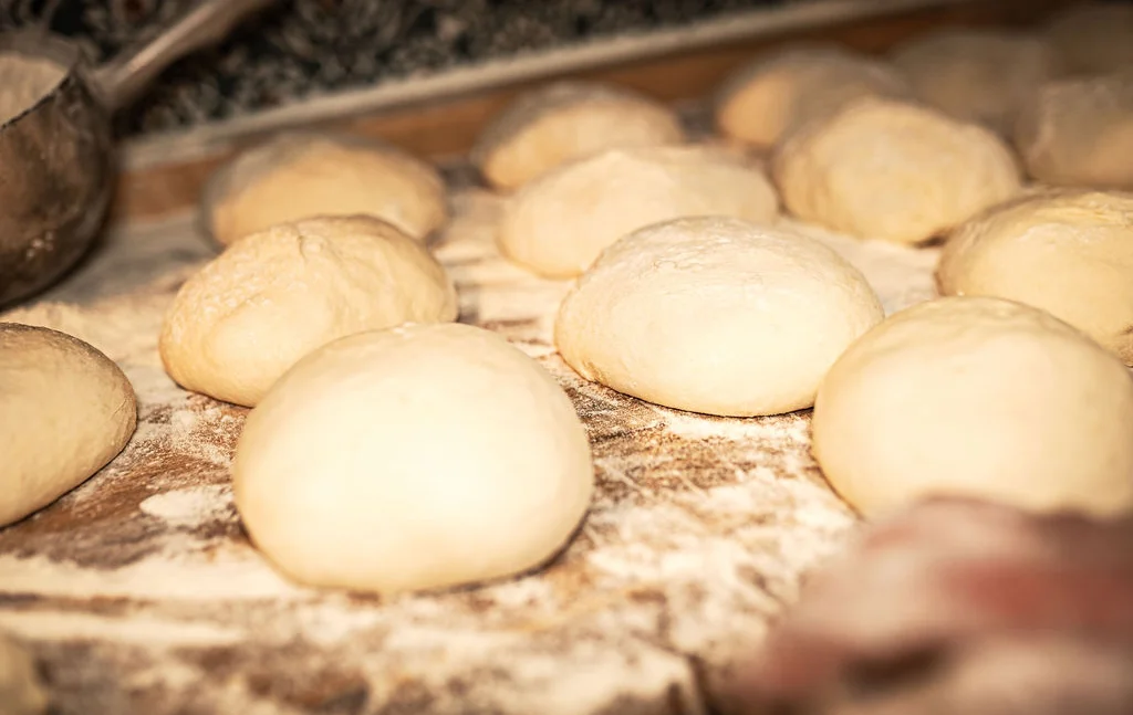 Freshly kneaded pizza dough ready for baking