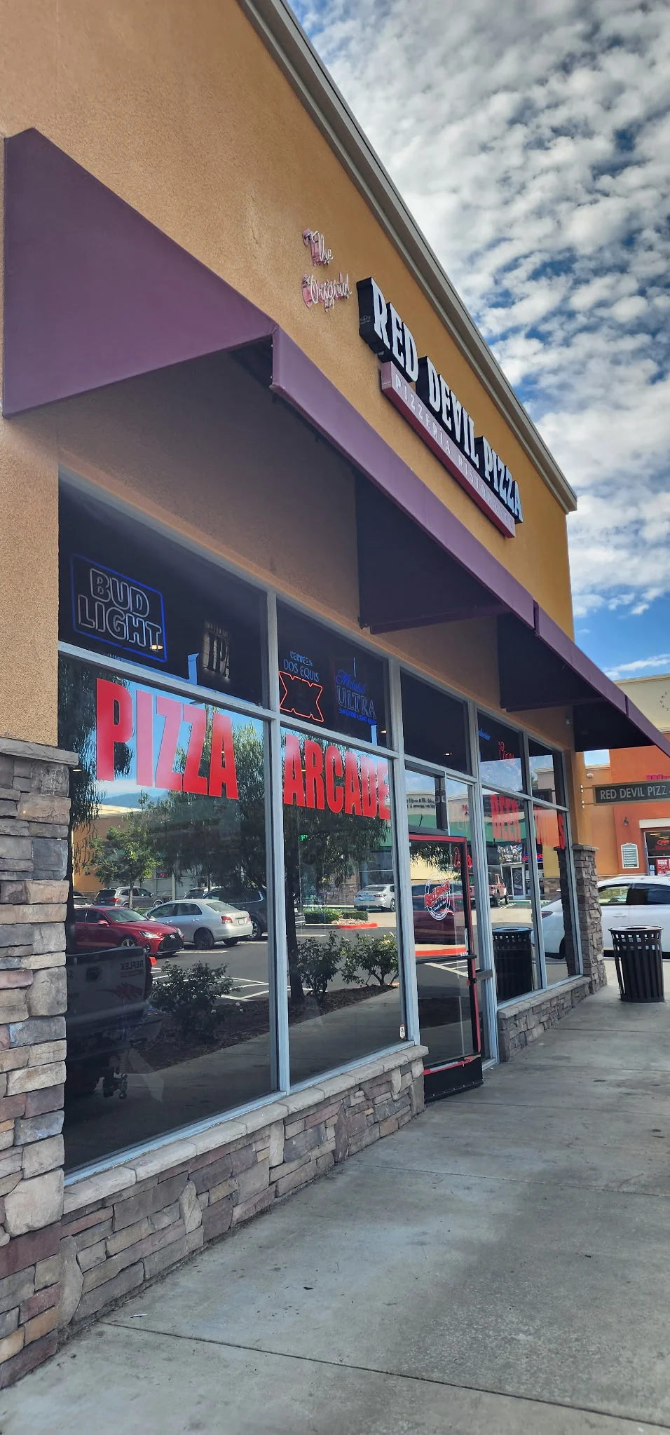 Exterior view of Red Devil Pizza restaurant with arcade games