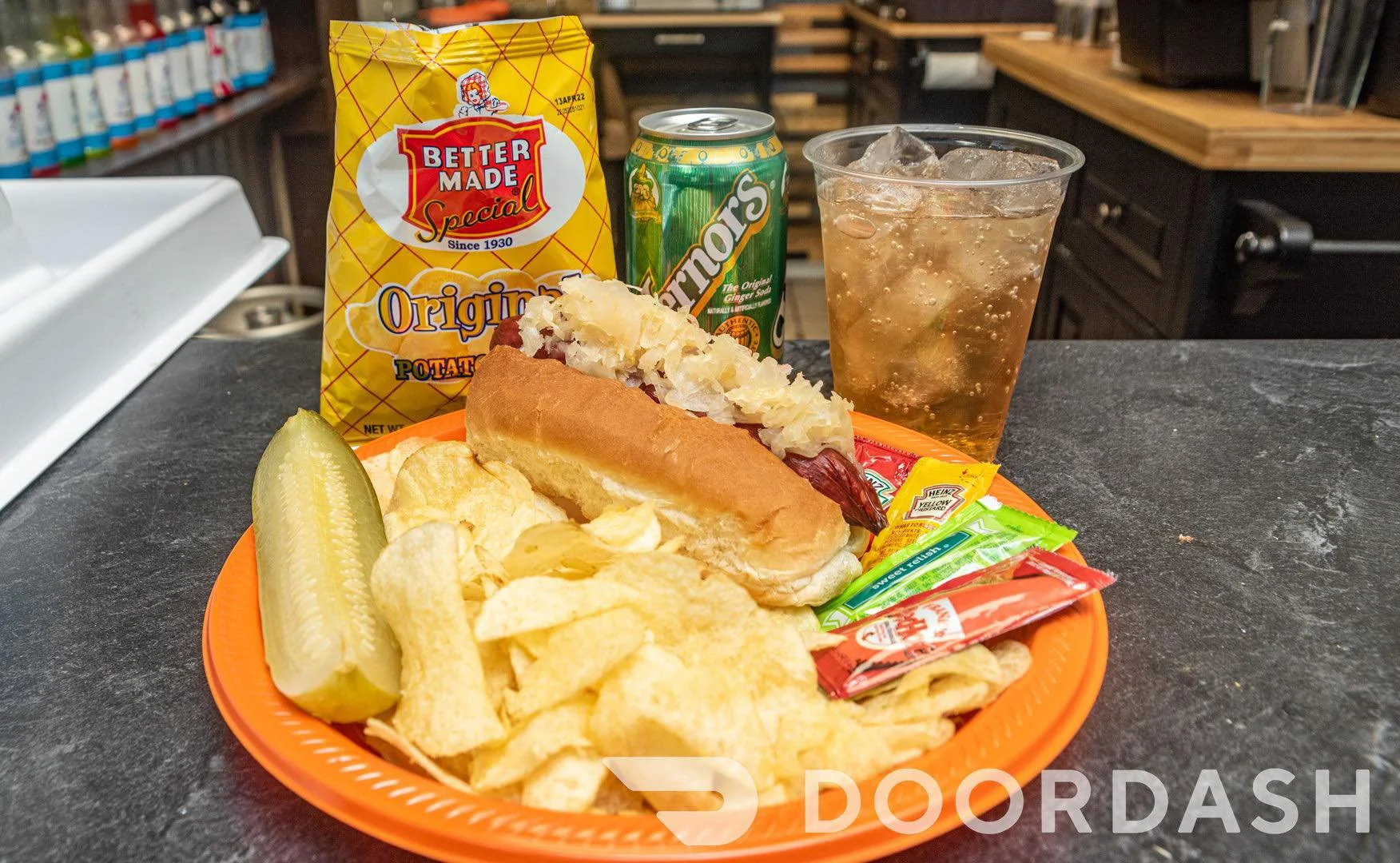 Delicious hot dogs chips and pickle