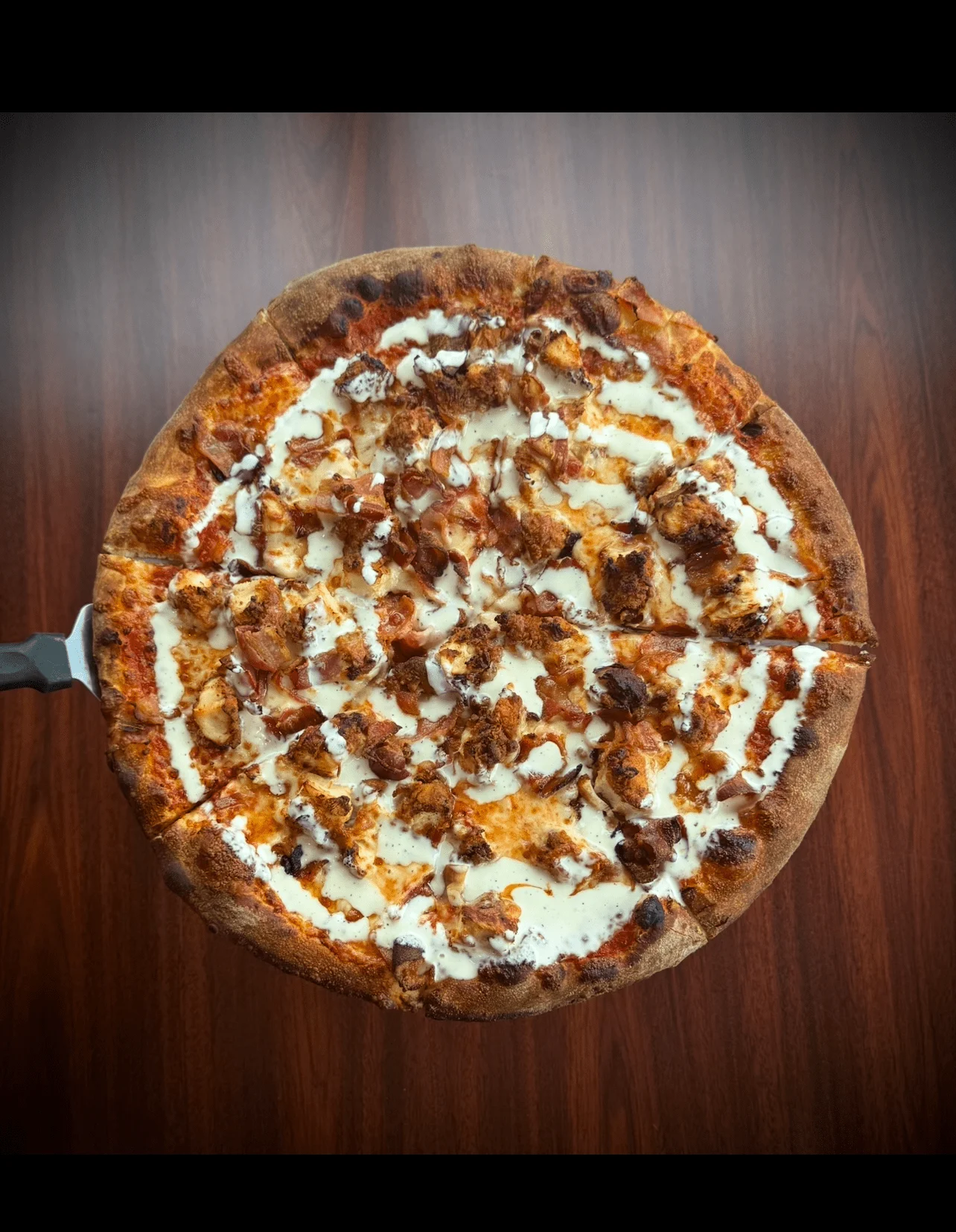 BBQ chicken pizza with creamy drizzle