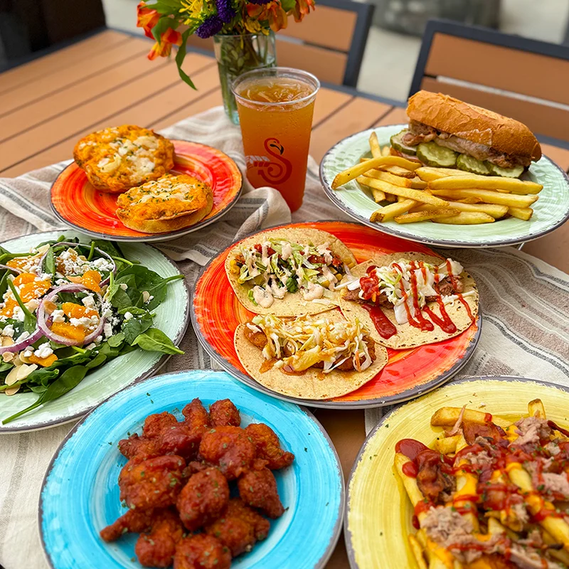 Fresh ingredients and homemade soups at Isaac's Craft Kitchen & Brewery, featuring shrimp, vibrant bell peppers, spinach, carrots, tomatoes, and artisanal ingredients. A farm-to-table selection highlighting produce and seafood.