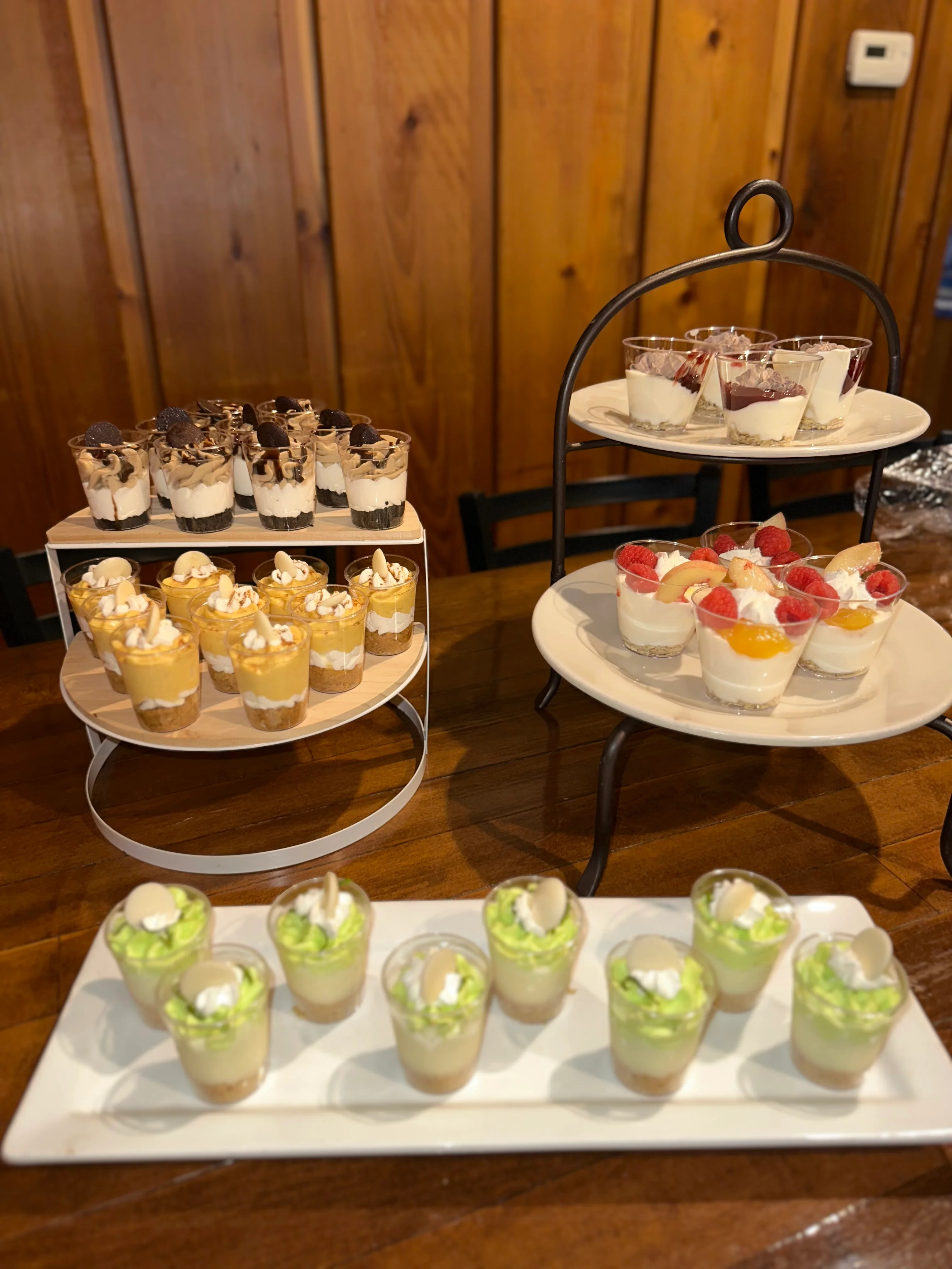 Assorted dessert parfaits in elegant glass cups