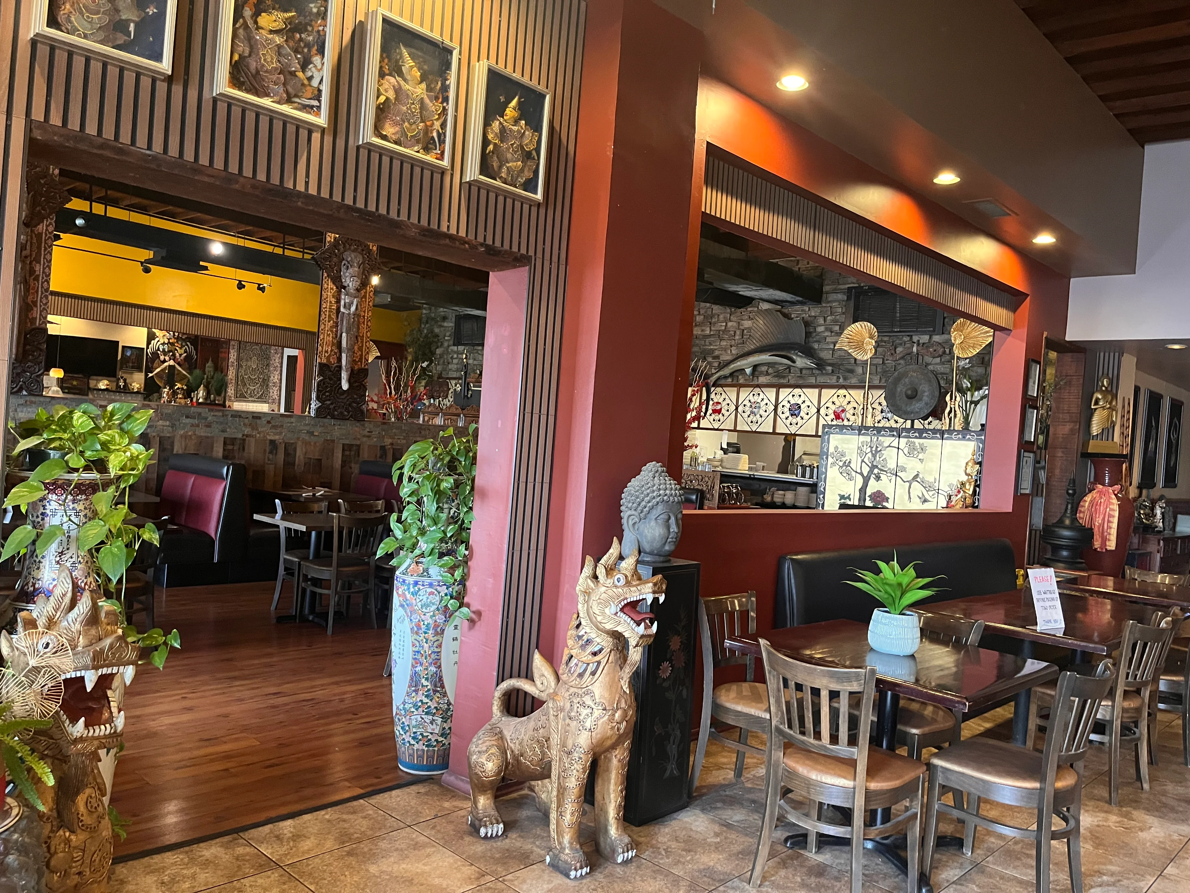 Cozy restaurant interior with vibrant decor and wooden furnishings