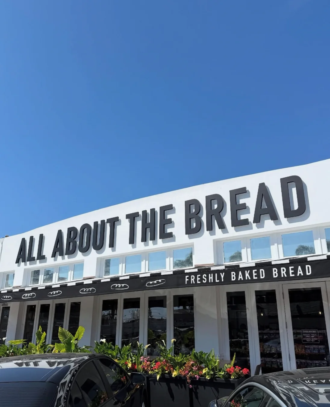 Exterior of All About The Bread bakery with fresh baked goods