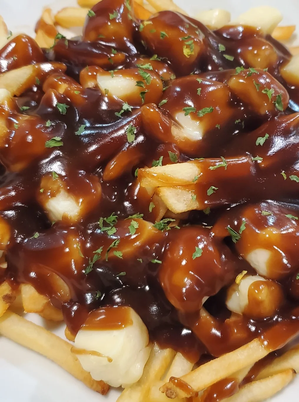 Classic Canadian poutine with fries, cheese curds, and gravy