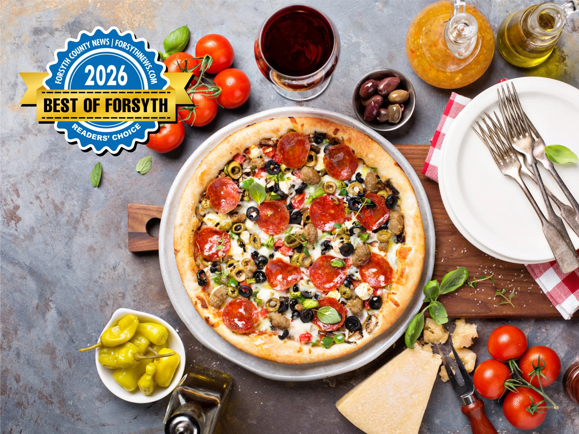 Delicious pepperoni pizza with olives and fresh basil
