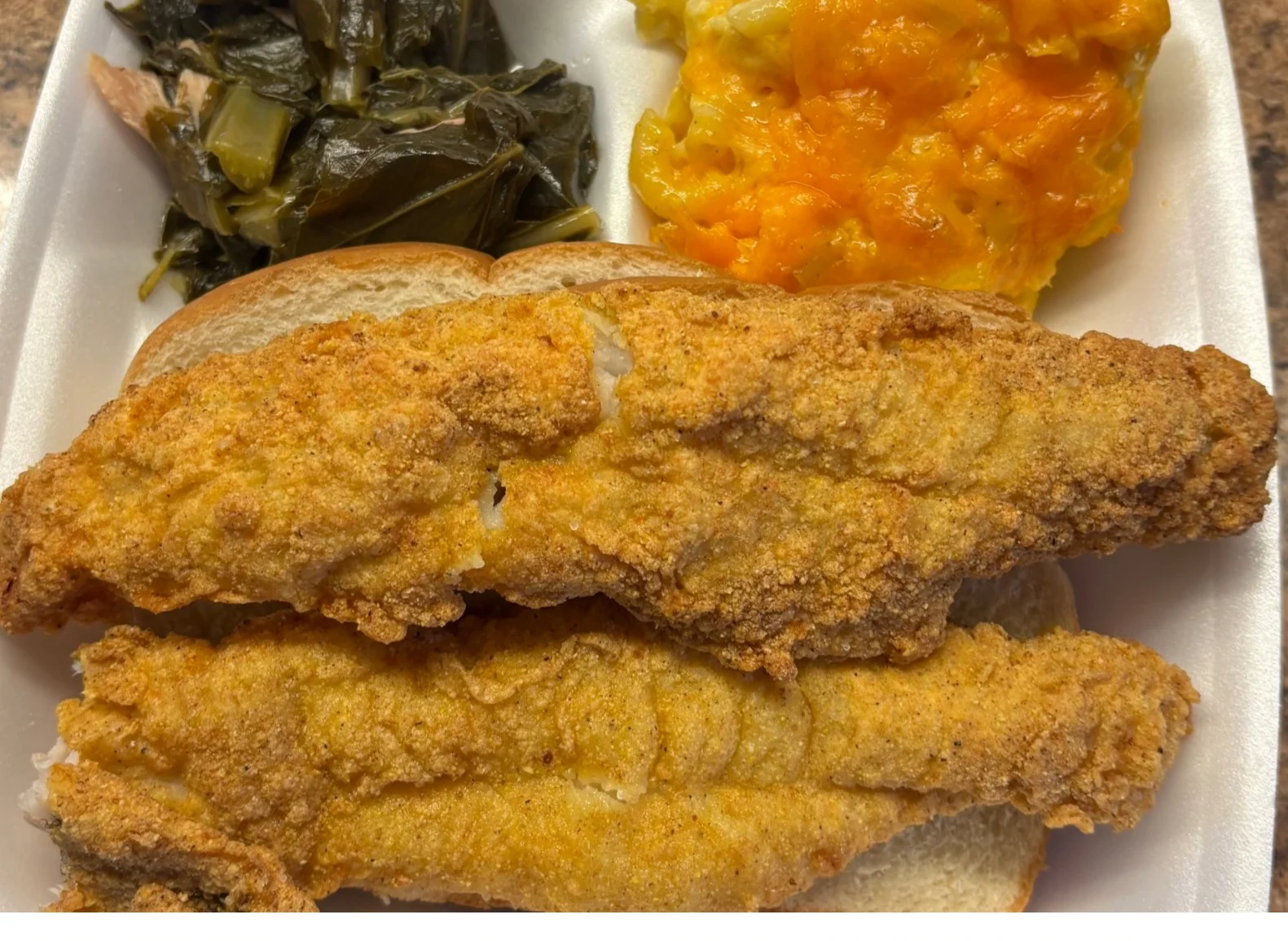 Southern fried chicken with mac and cheese and collard greens