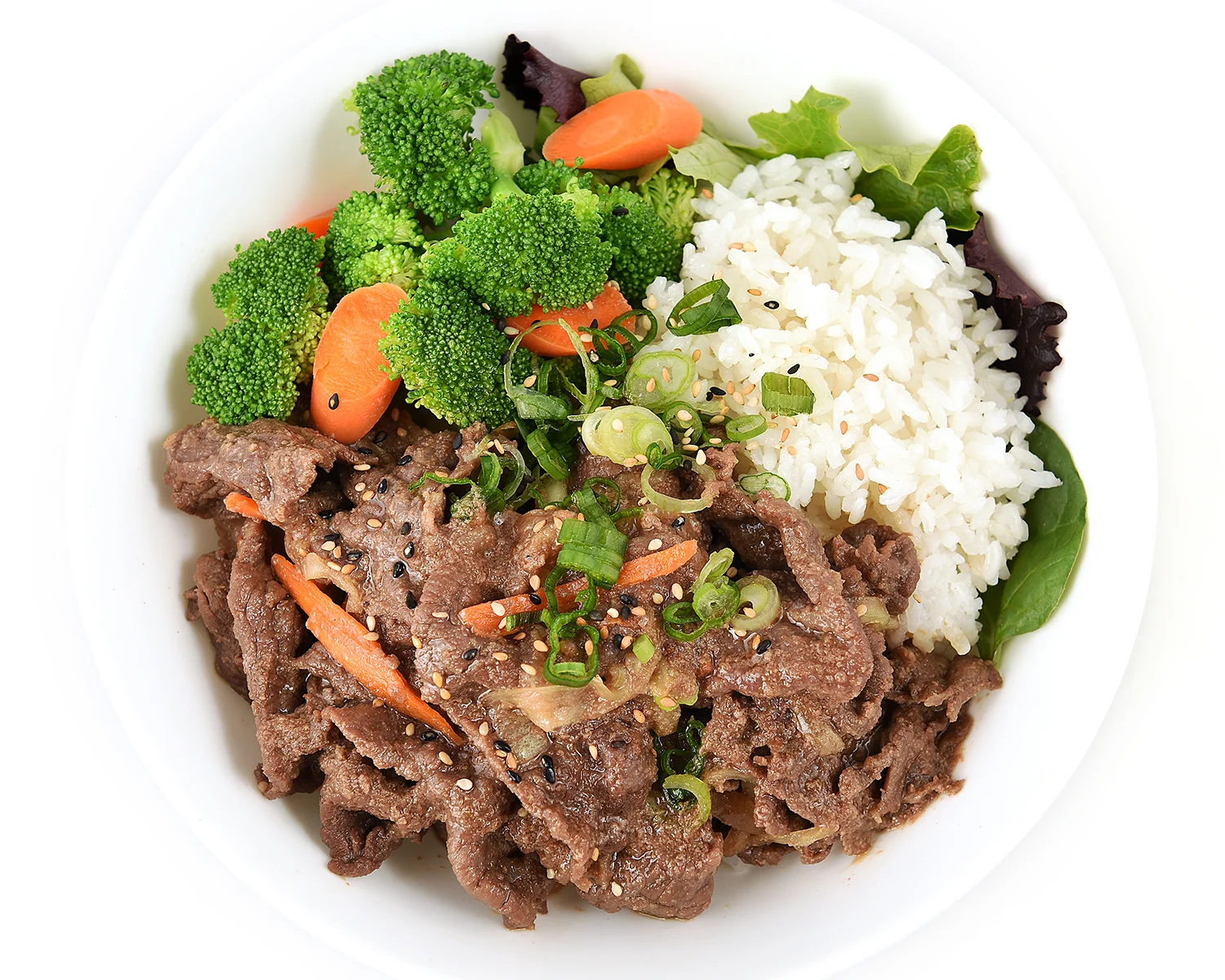 Korean bulgogi beef bowl with vegetables and rice
