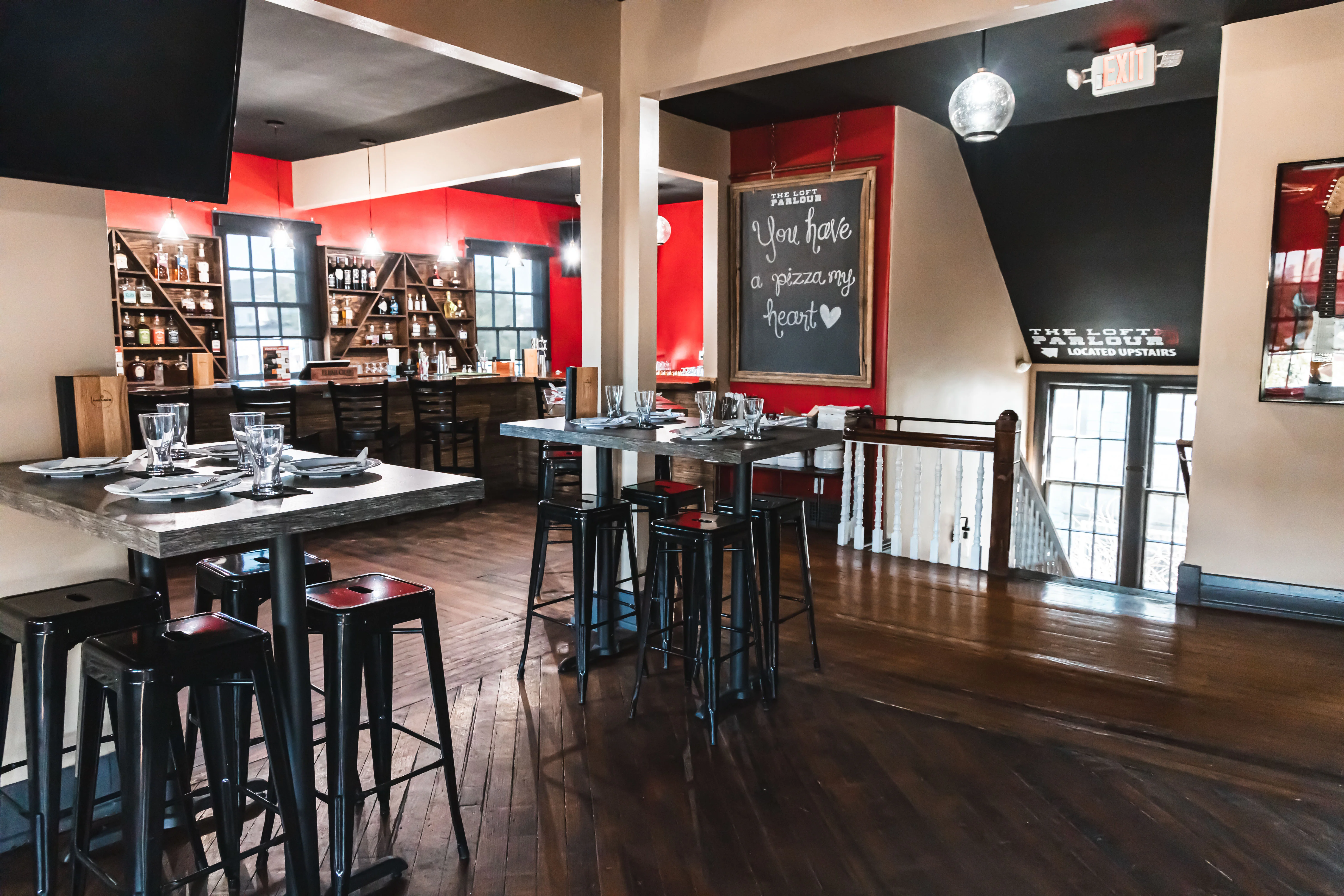 Cozy restaurant interior with modern decor and bar area