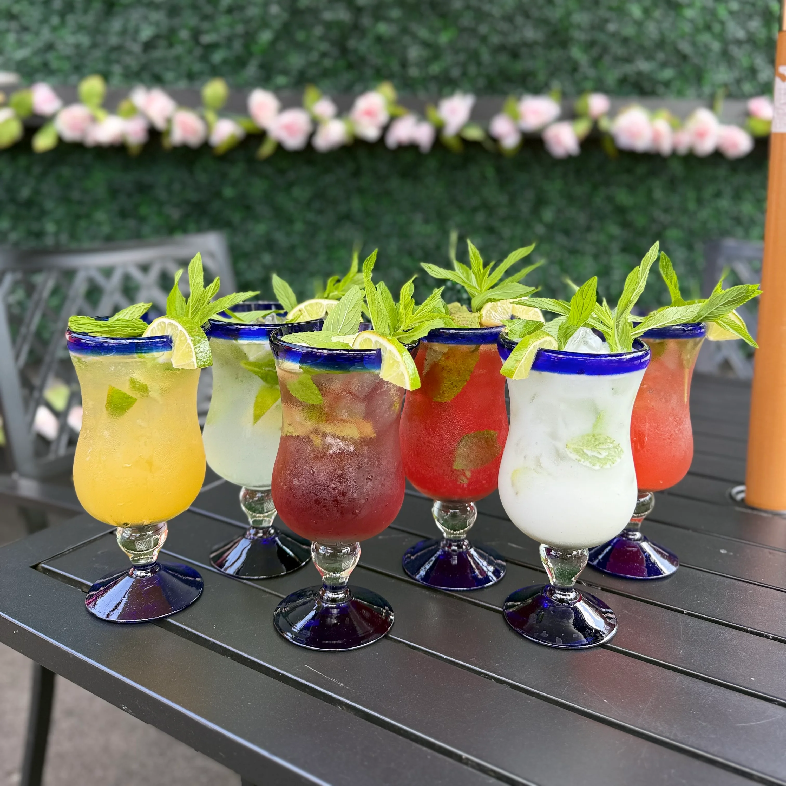 Colorful cocktails with mint and lime at Jalisco Bar & Grill