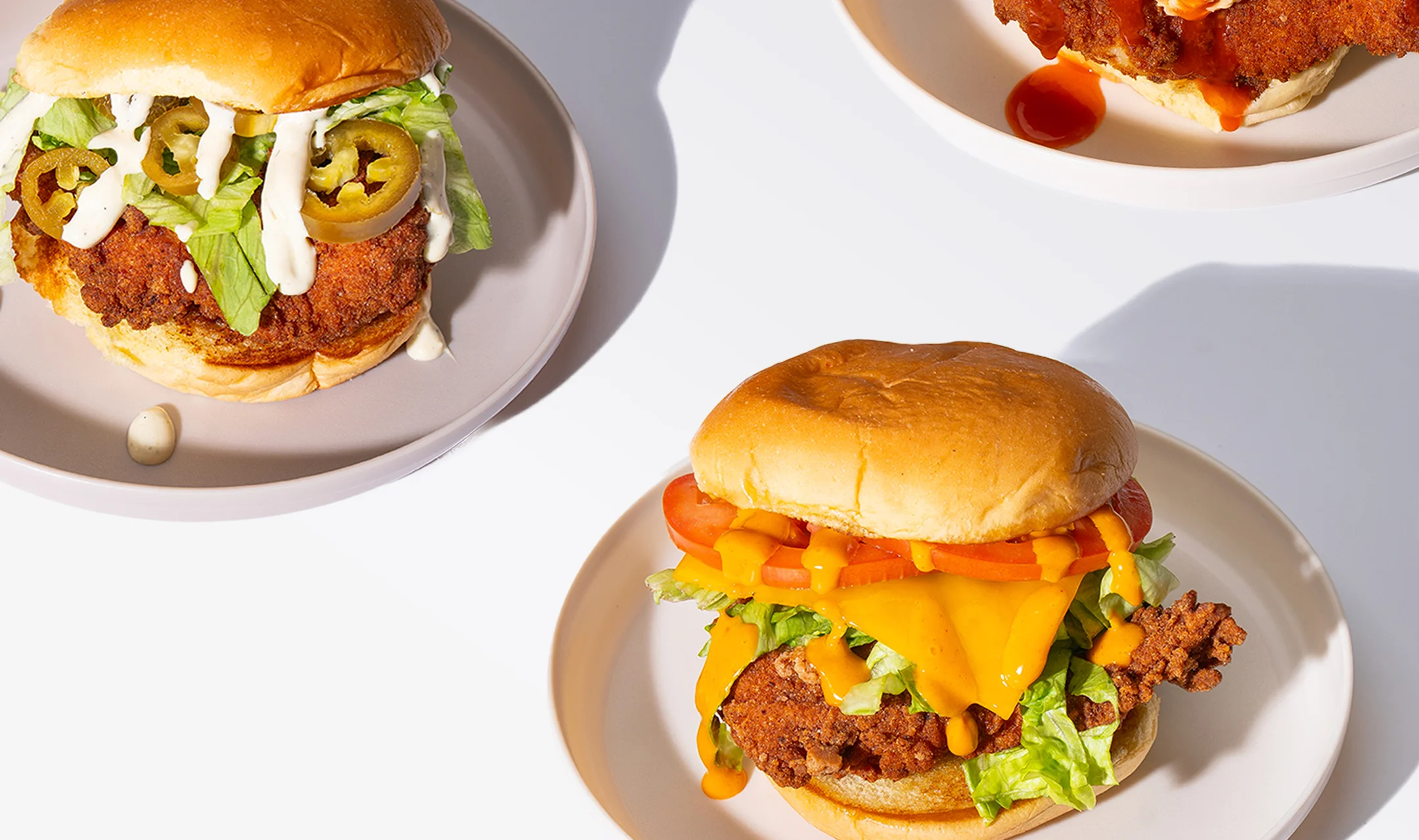Fried chicken sandwiches with fries and drinks