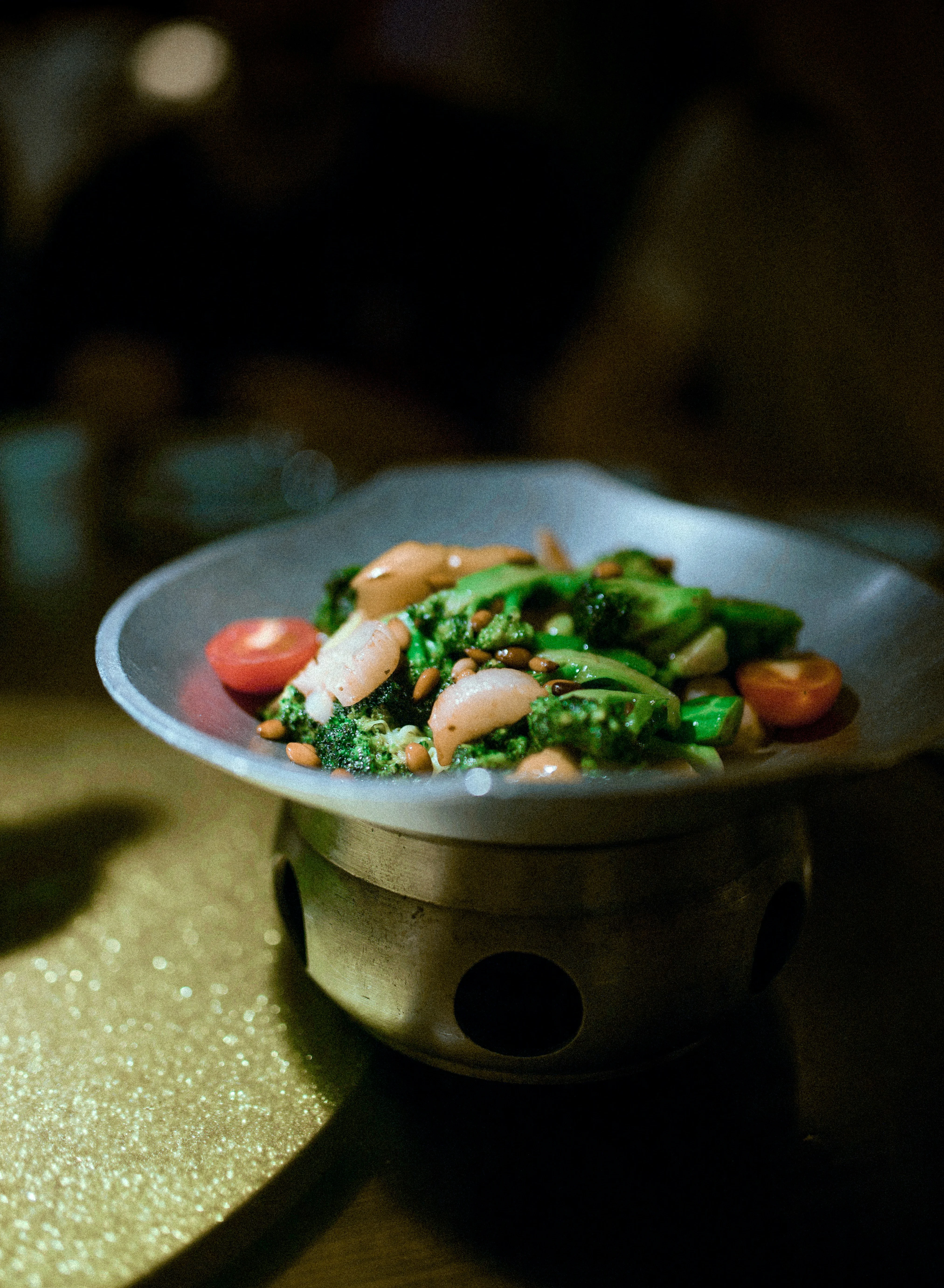 Stir-fried Chinese broccoli with shrimp in a metal bowl