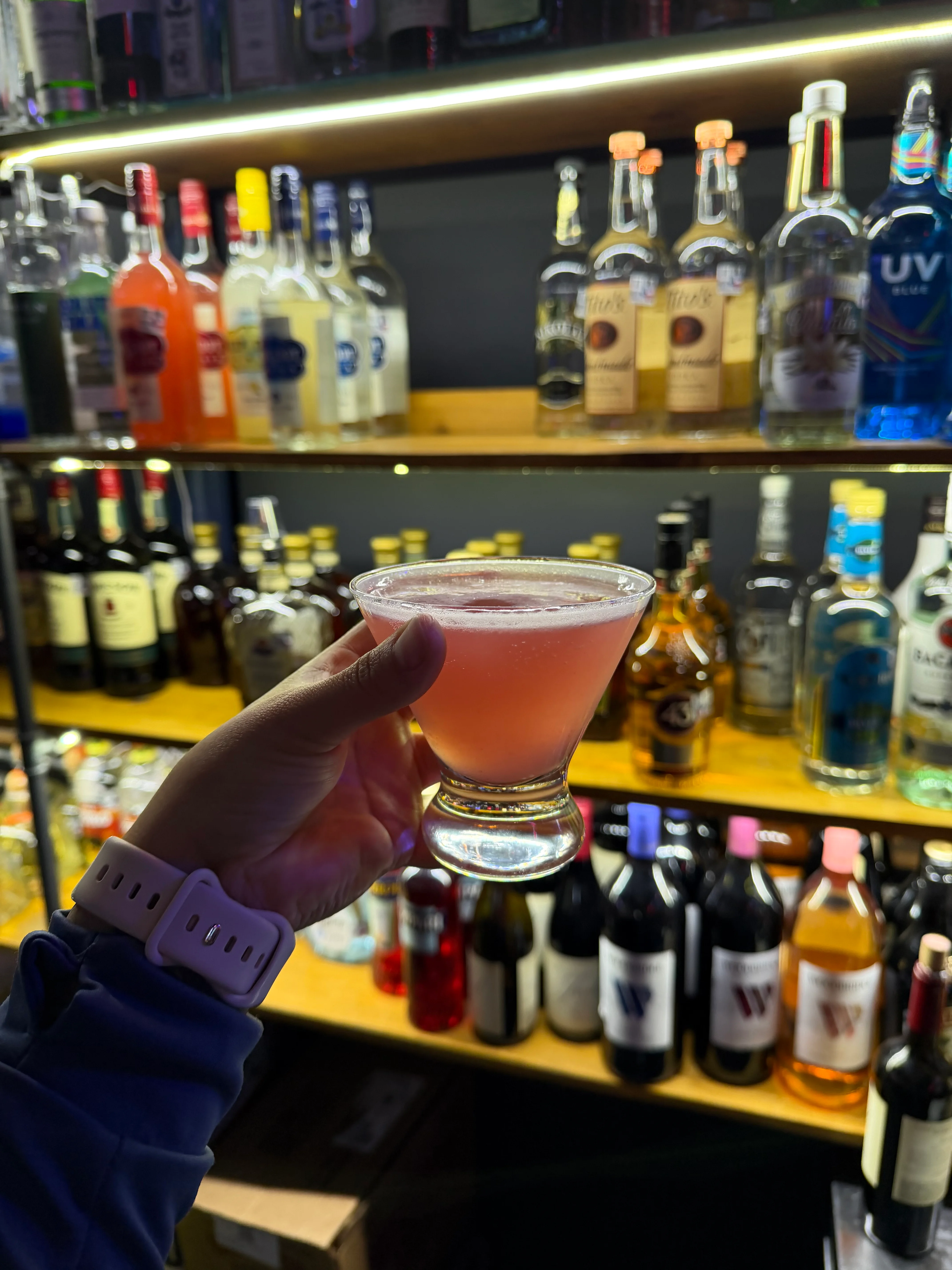 Colorful cocktail served at a modern bar