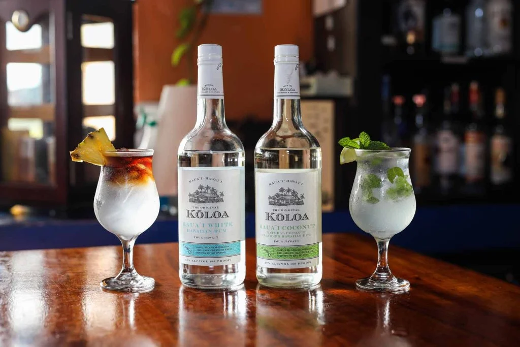 Koloa Hawaiian rum bottles with cocktails