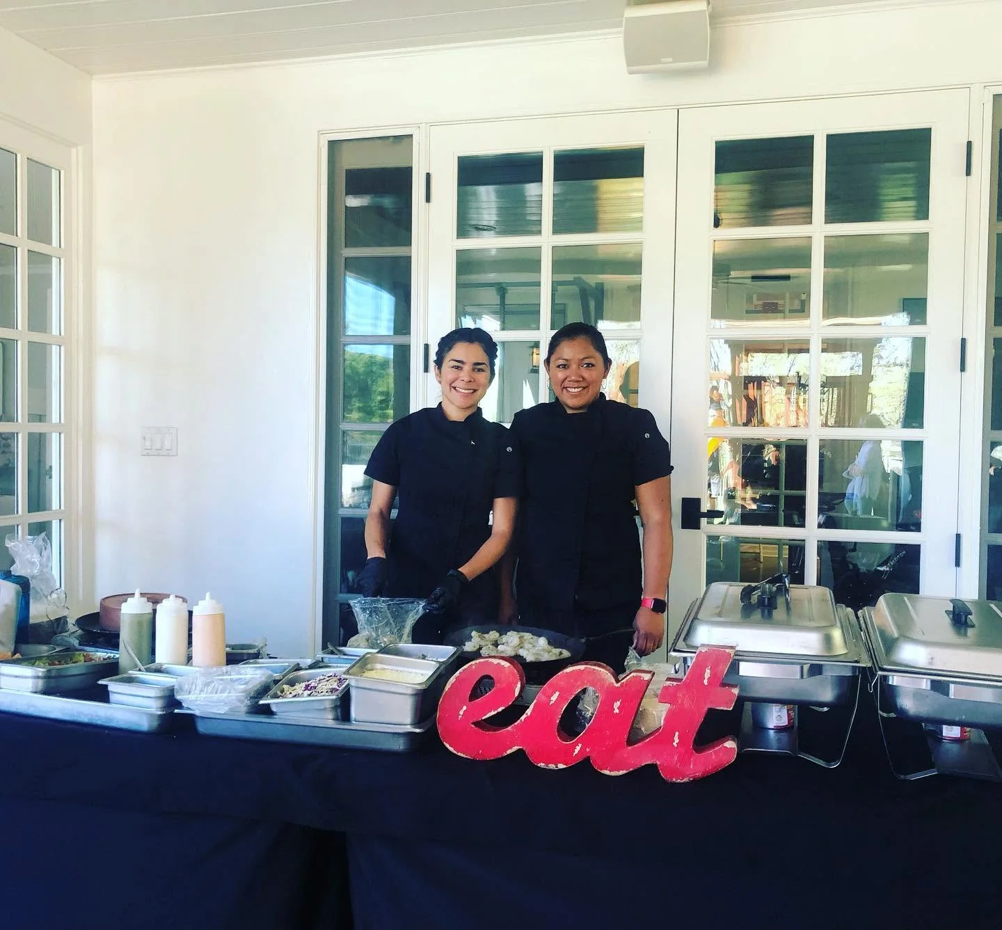 Catering team preparing dishes at an event