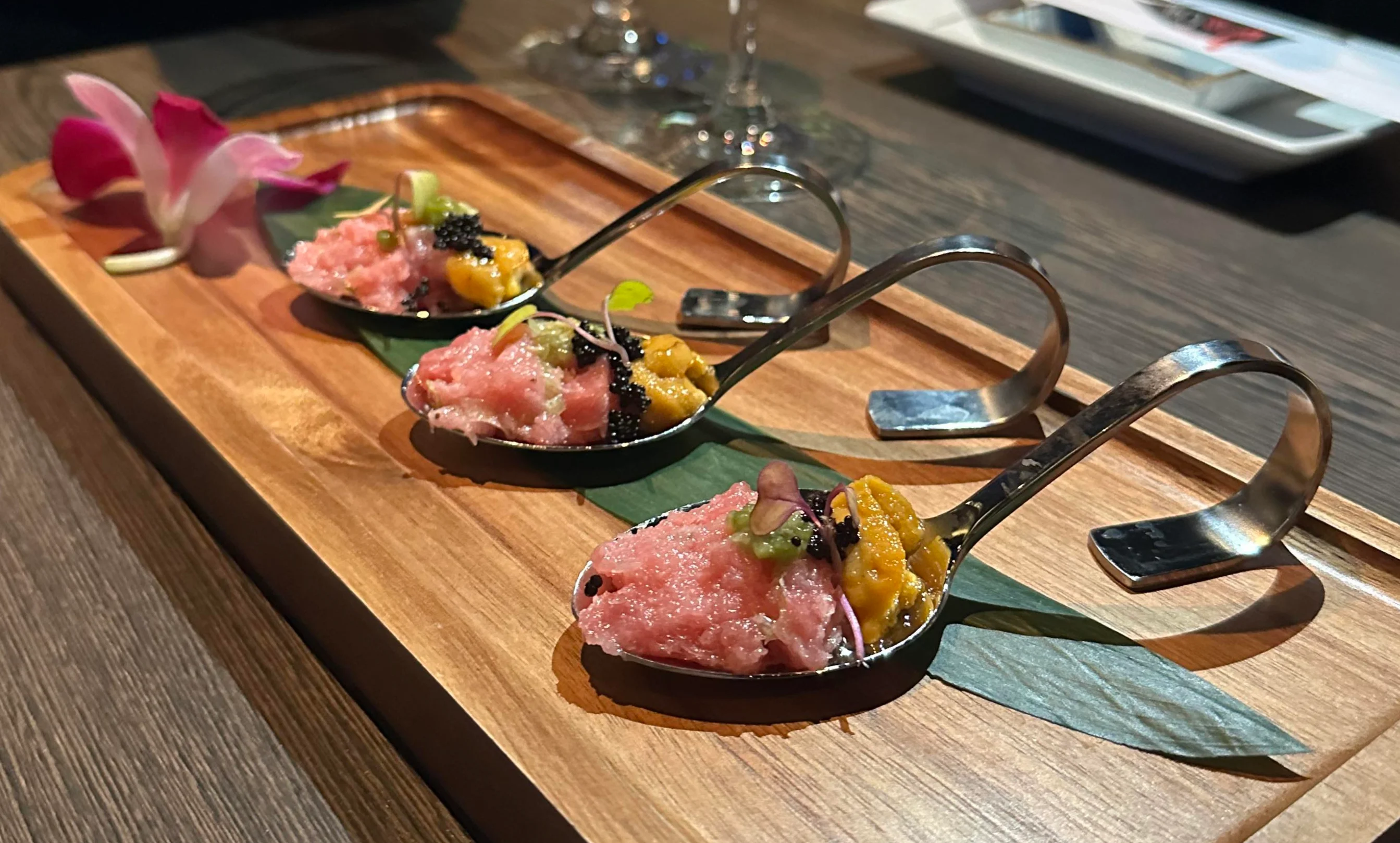 Japanese sushi tasting spoons with fresh toppings