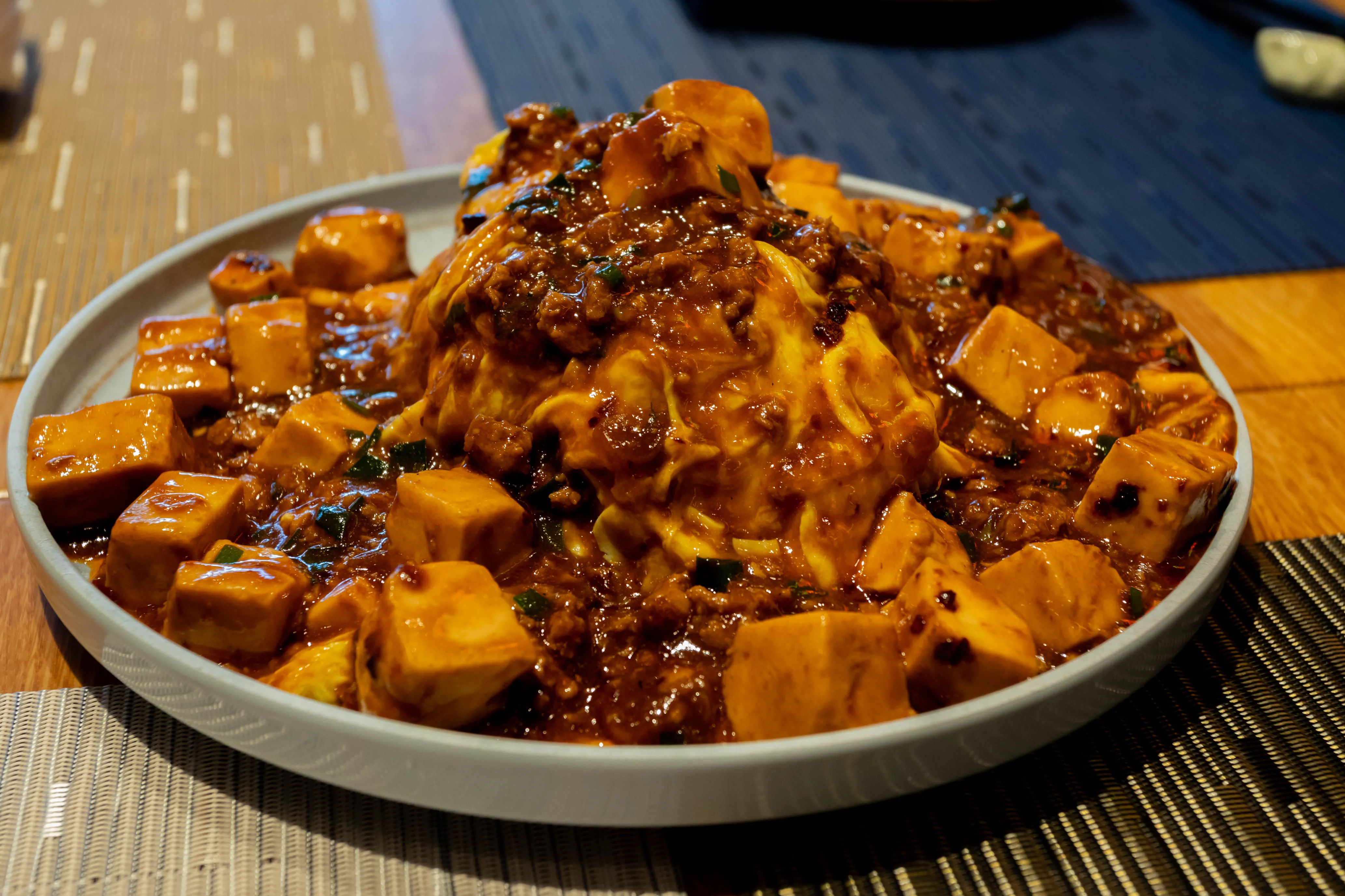 Chinese mapo tofu served with rice and savory sauce