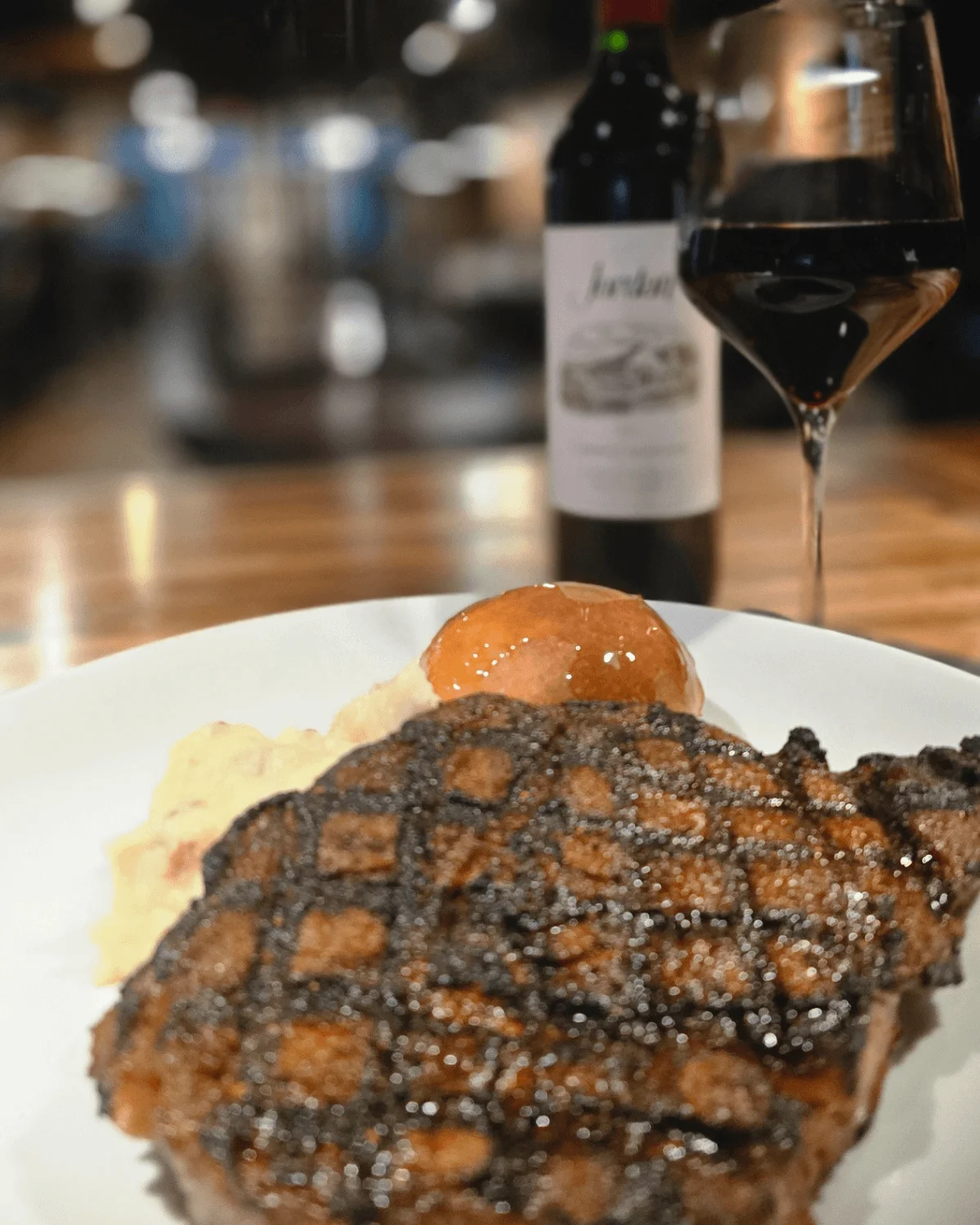 A flame grilled ribeye and Jordan Cabernet Sauvignon from Vault on Fillmore, Corinth, MS. 