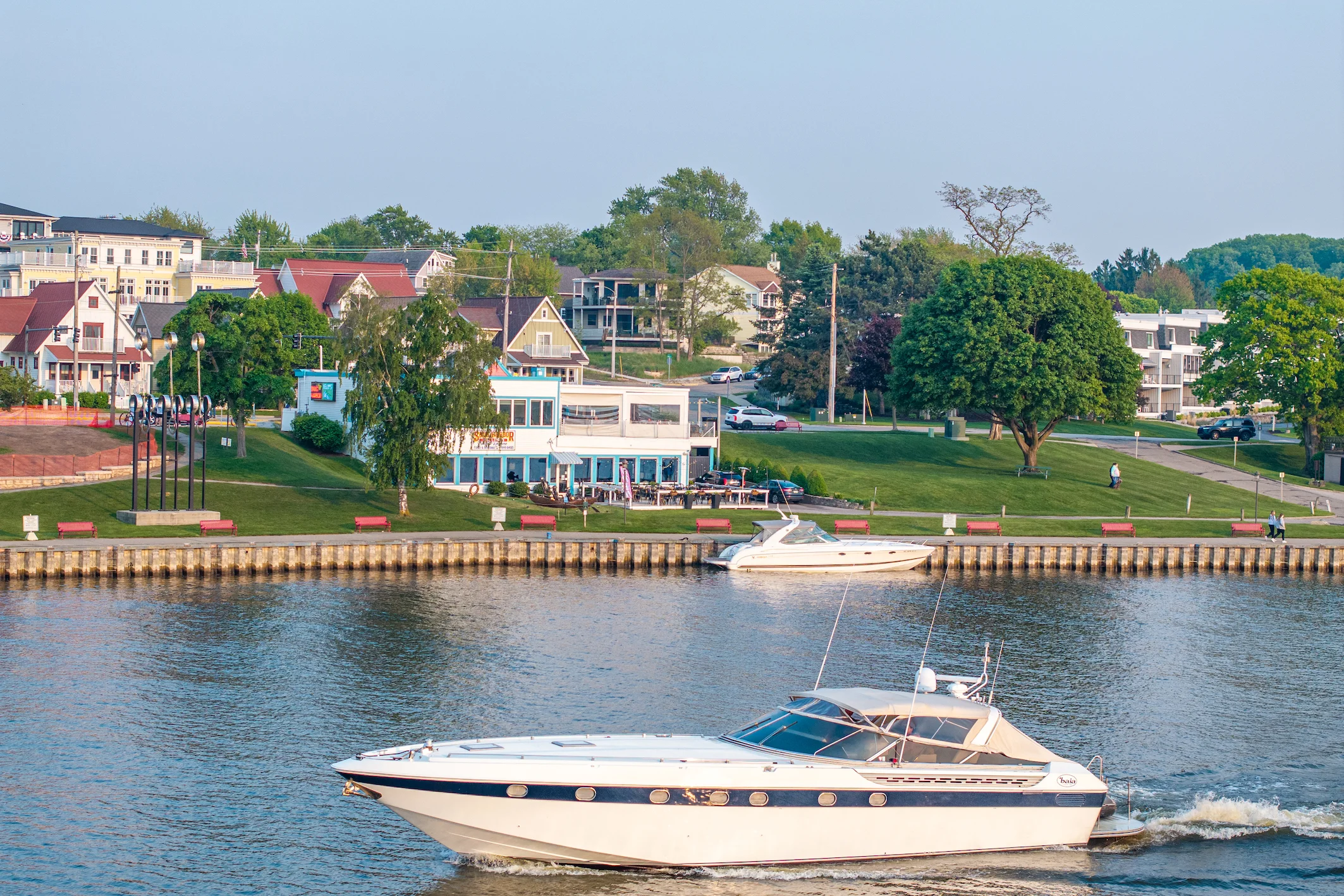 Scenic waterfront view with boats and charming buildings
