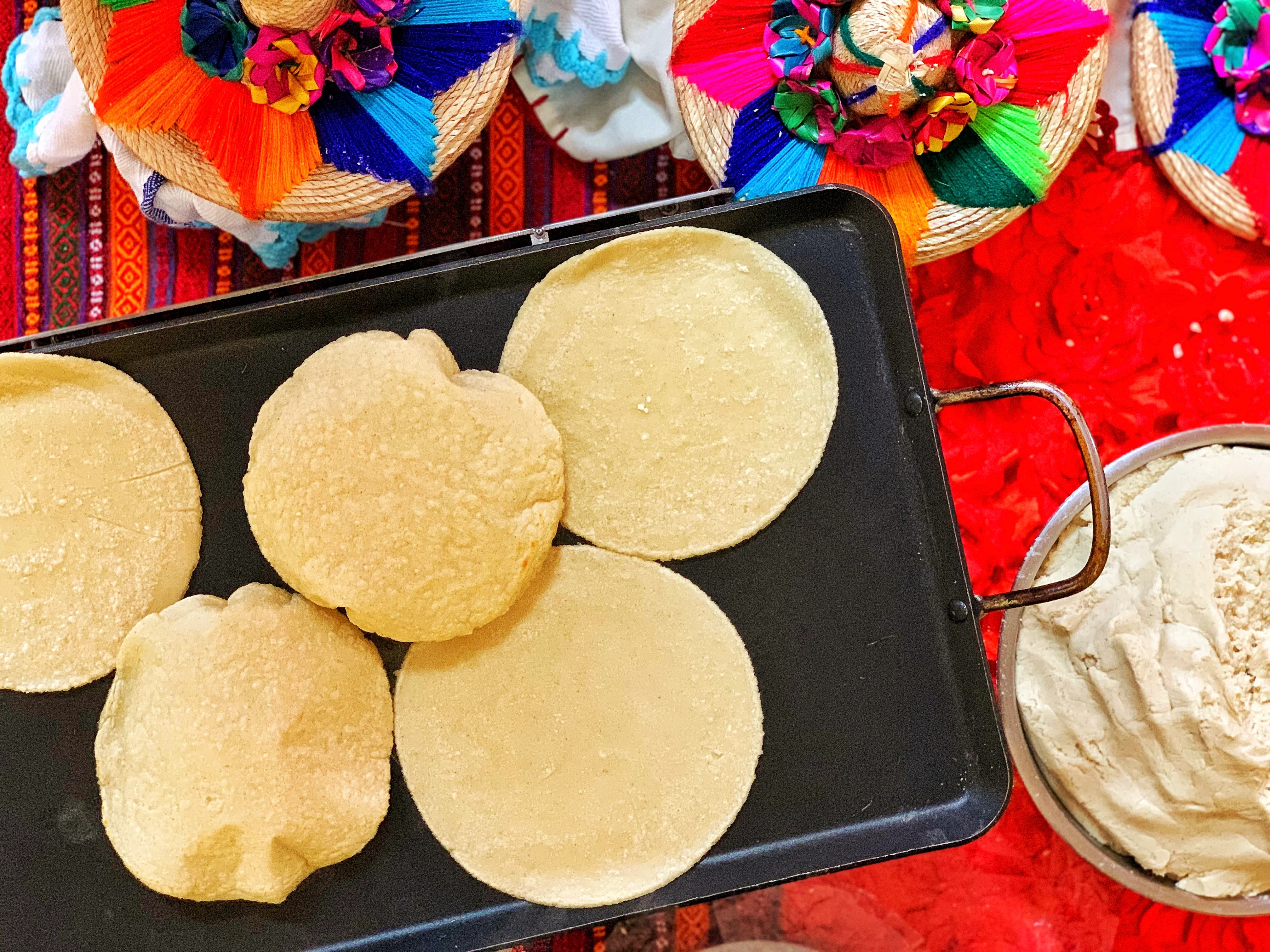 Freshly made Mexican tortillas on a griddle