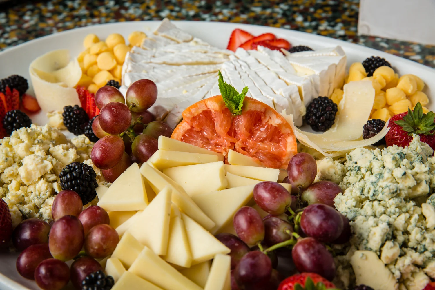 Artisan cheese platter with fruits