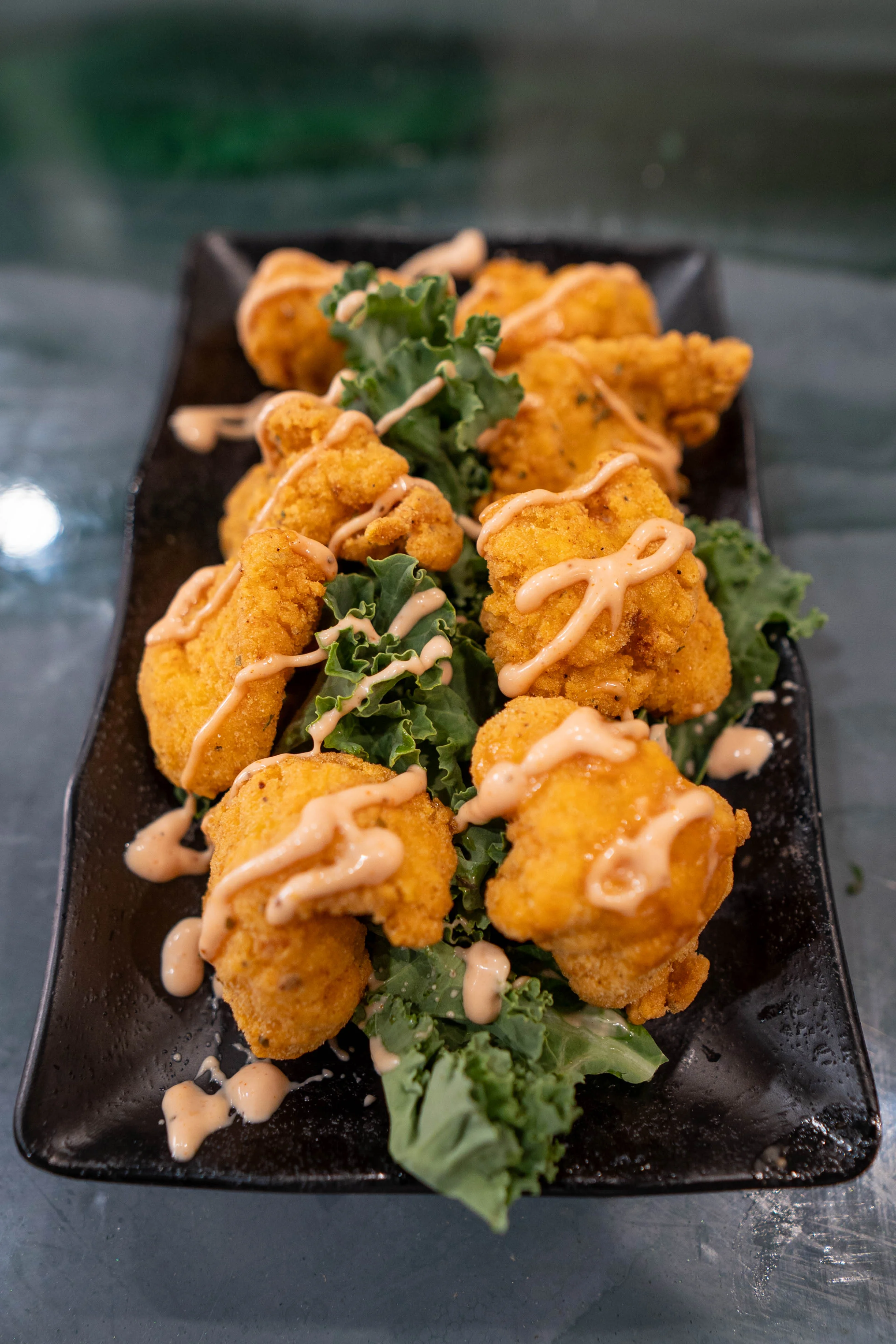 Southern-style fried catfish bites with spicy sauce