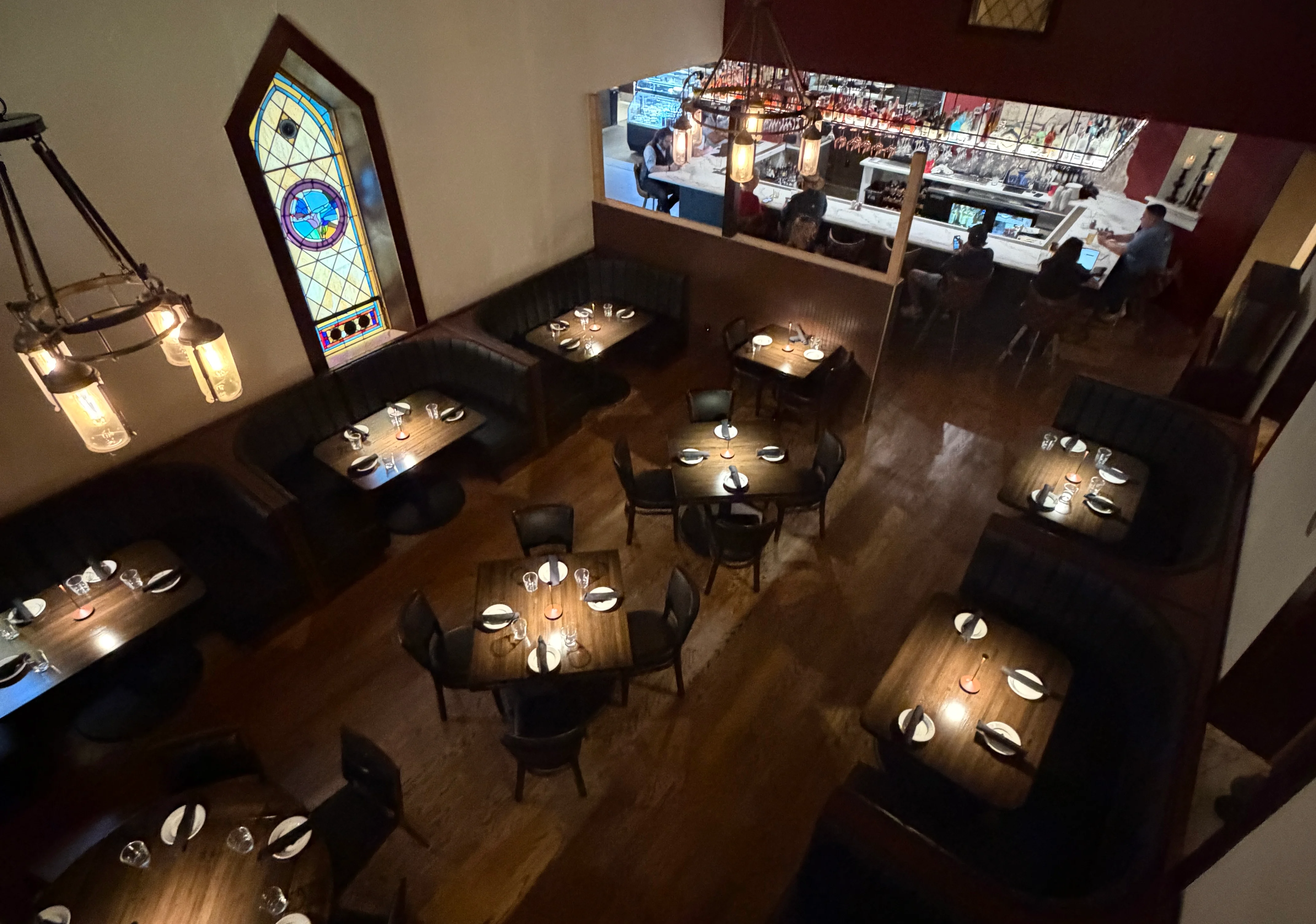 Stylish restaurant interior with stained glass and modern decor