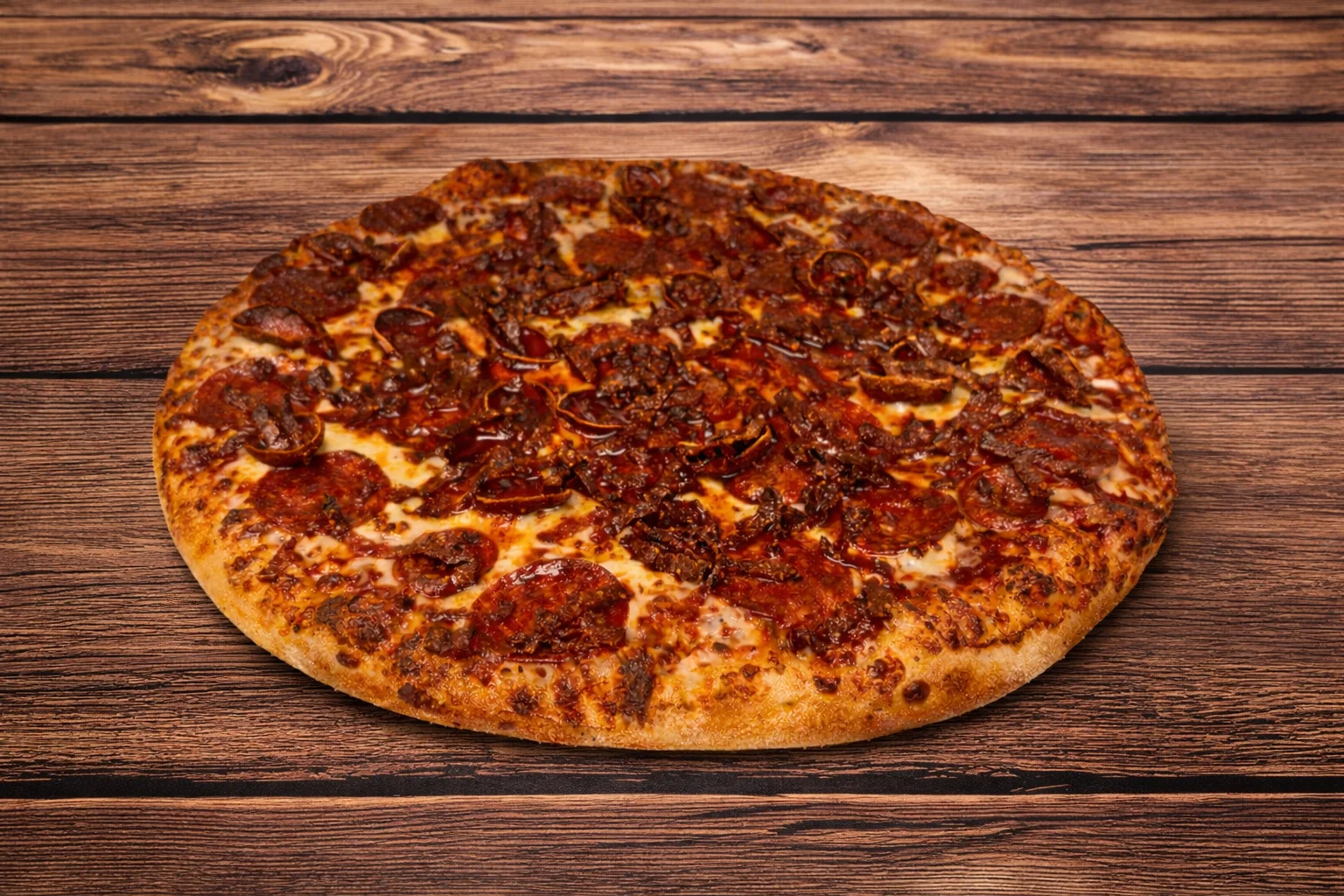 Loaded pepperoni pizza with spicy cured meat on a wood-fired style crust