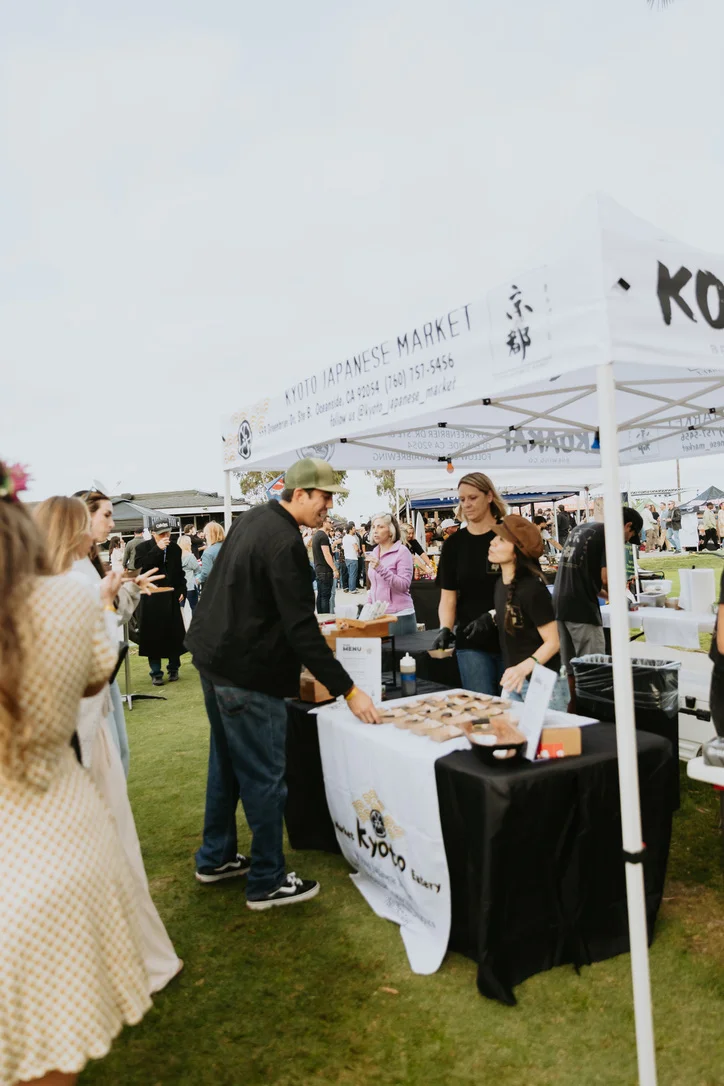 Kyoto Japanese Market booth at a vibrant outdoor event