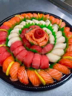 Artfully arranged sushi platter showcasing various types of nigiri