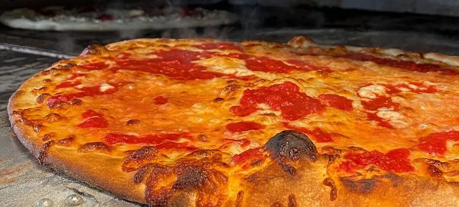 Margherita pizza fresh from a wood-fired oven
