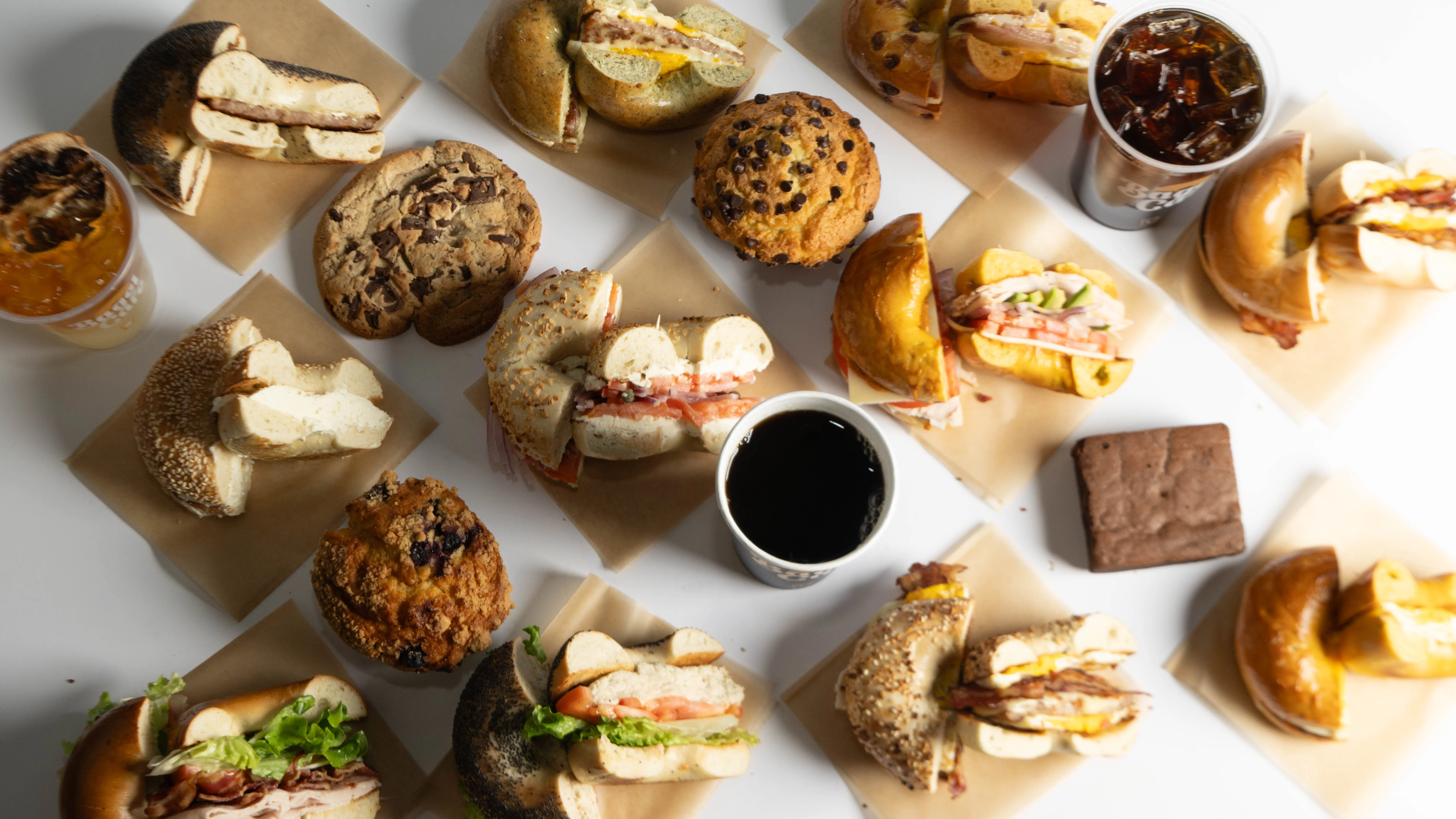 Assorted bagels and baked goods on a table
