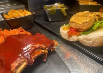 BBQ ribs and Southern-style sandwich with fried green tomatoes