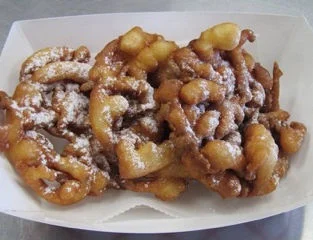 Crispy funnel cake dusted with powdered sugar