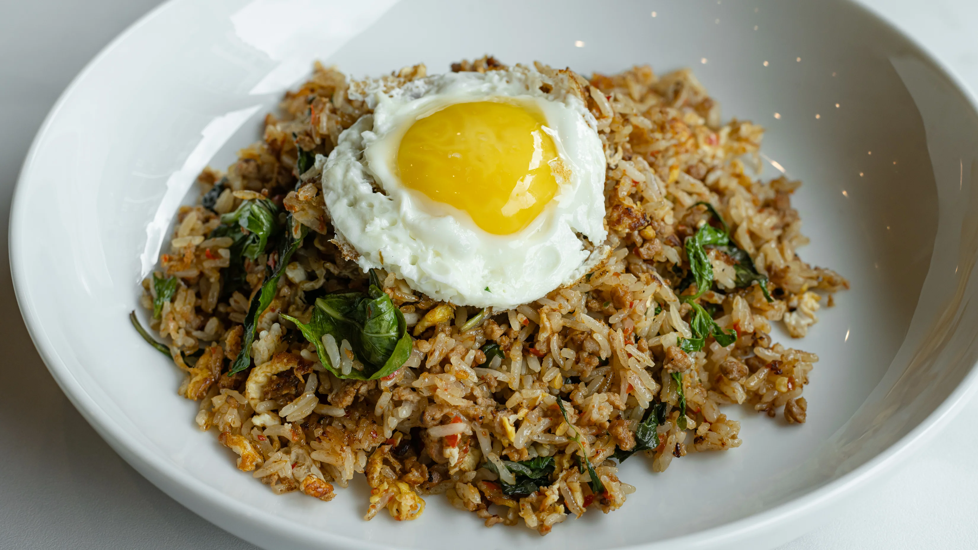 Indonesian nasi goreng topped with a fried egg
