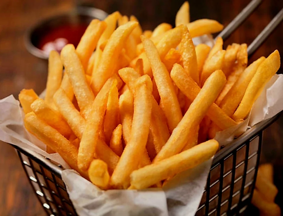 Crispy French fries served in a basket