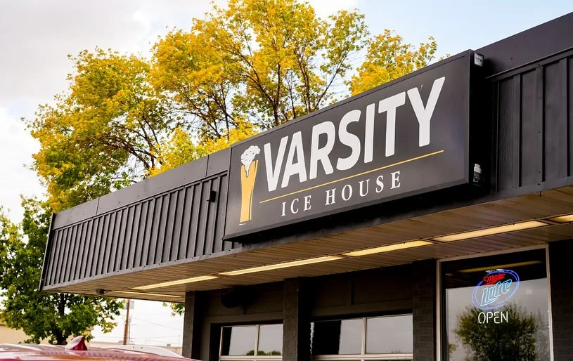 Exterior view of Varsity Ice House restaurant with signage