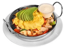 Sizzling chicken fajitas with fluffy scrambled eggs