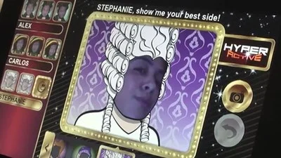 Interactive photo booth with playful cartoon filter