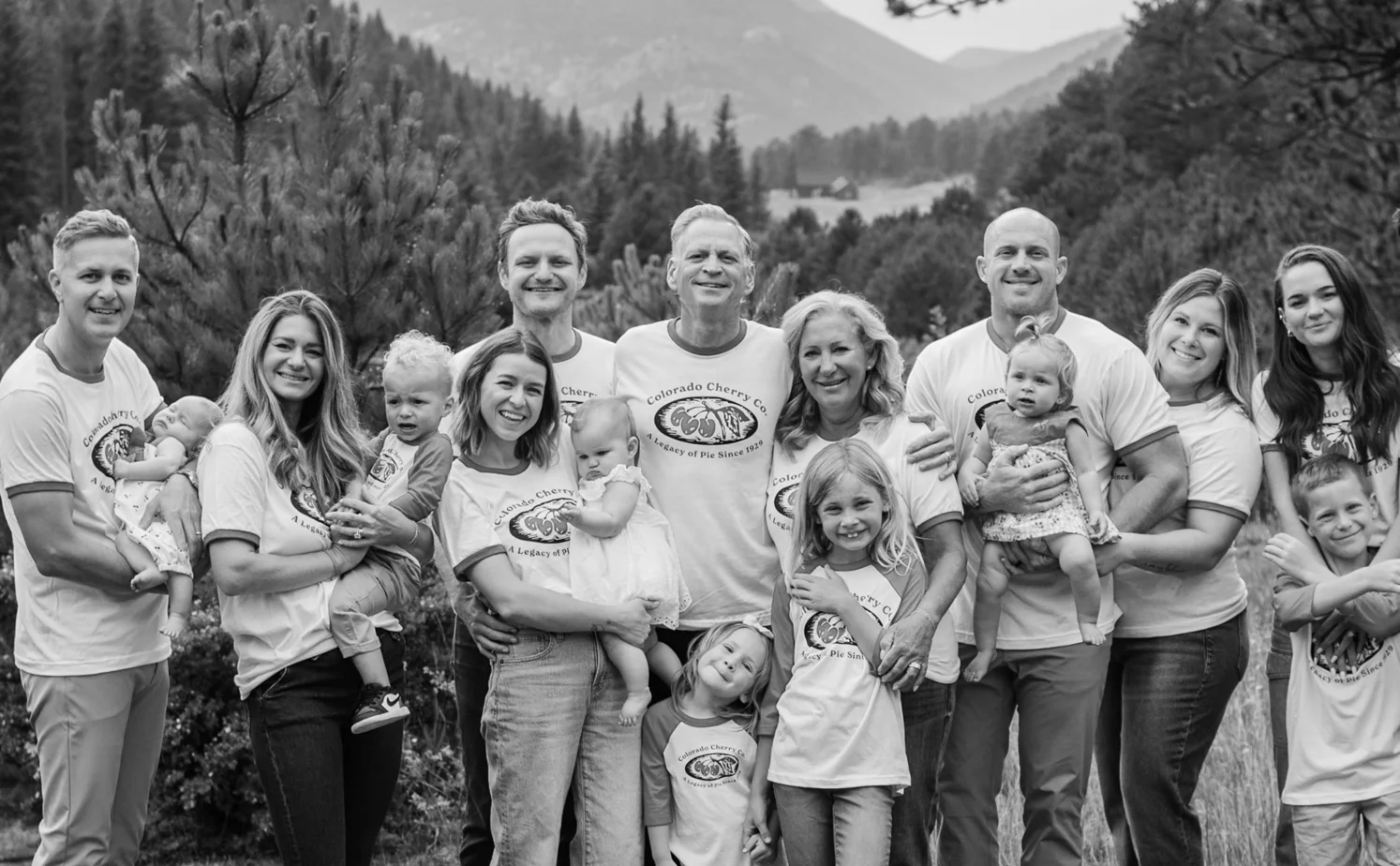 Family gathering in a scenic mountain landscape
