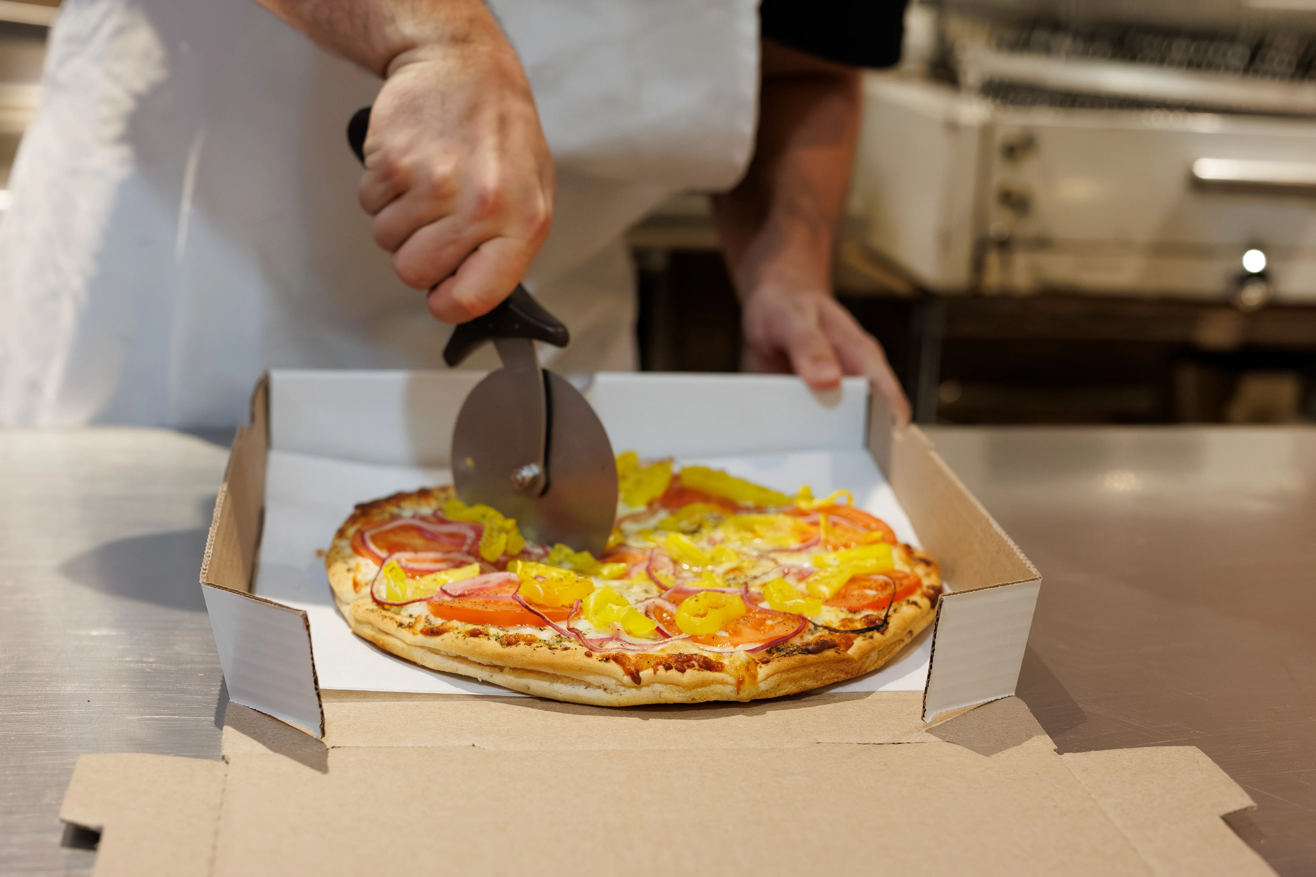 Freshly cut pepperoni pizza ready for serving