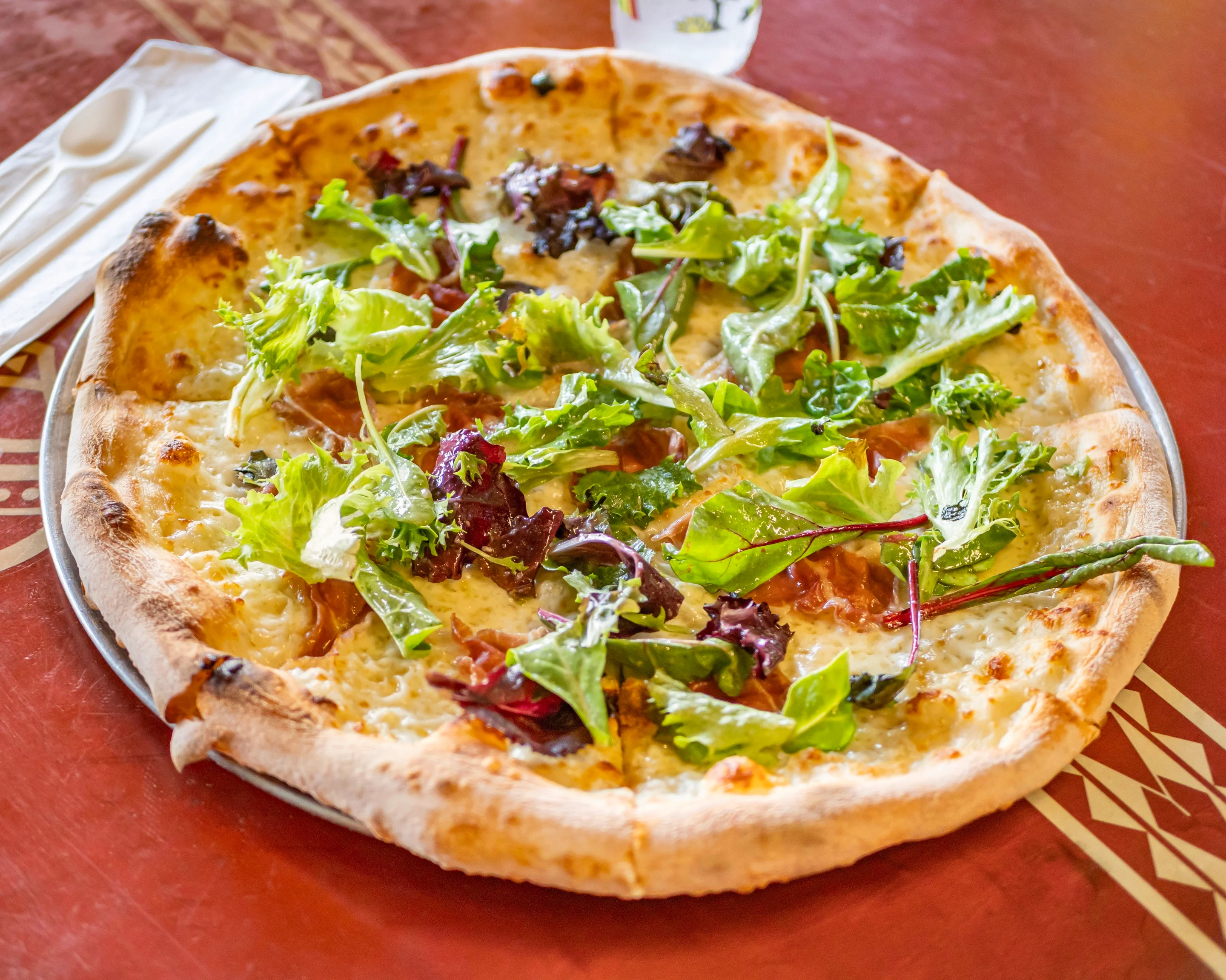 Fresh salad pizza with mixed greens